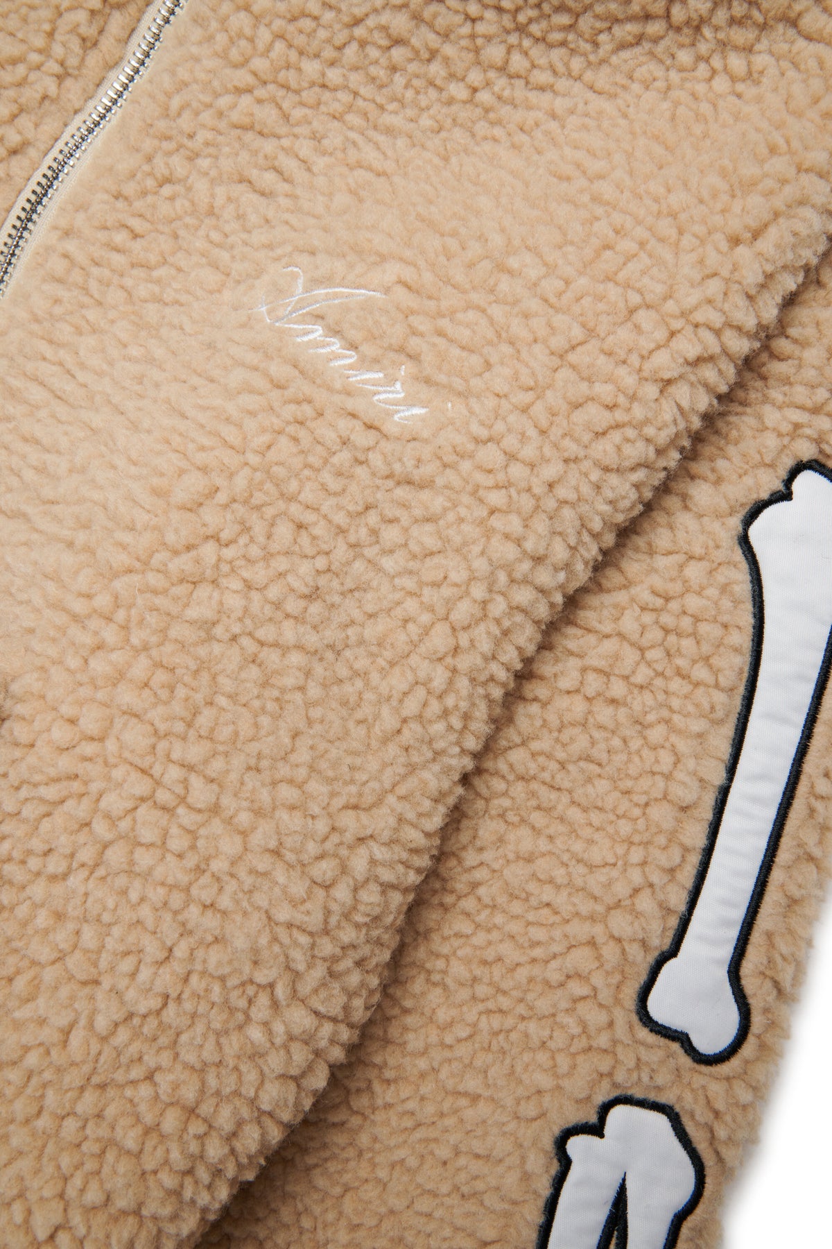Teddy jacket with bone details