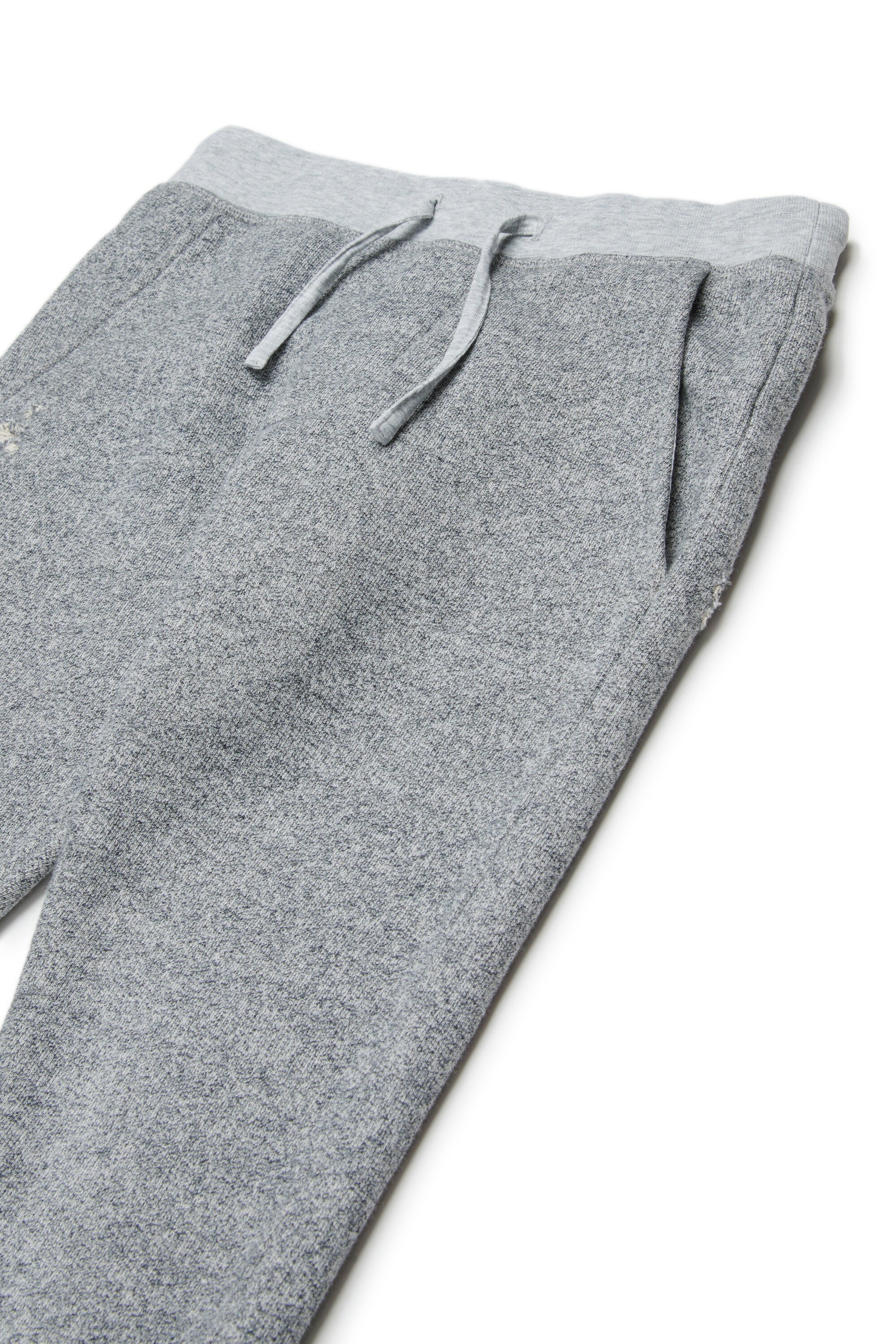 Fleece jogger pants with ruined effect