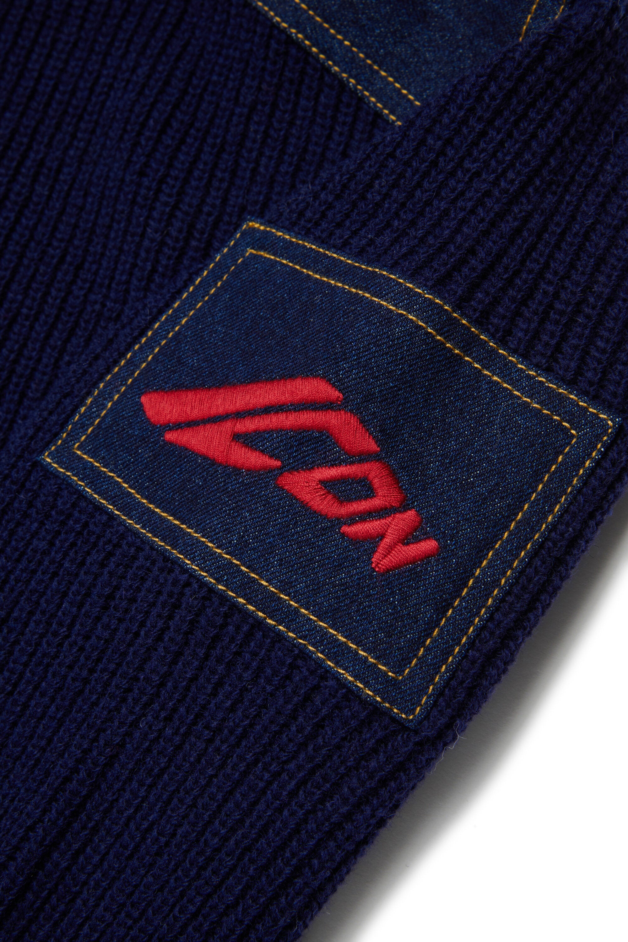 Wool blend pullover with denim inserts