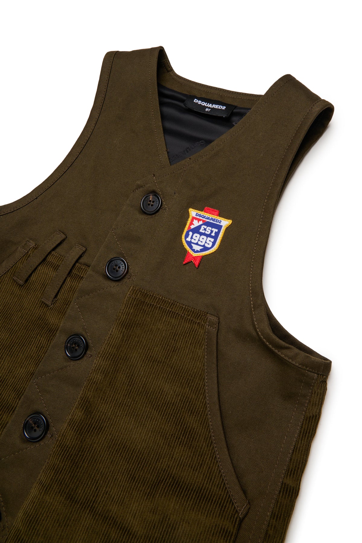 Vest with decorative patches and logo