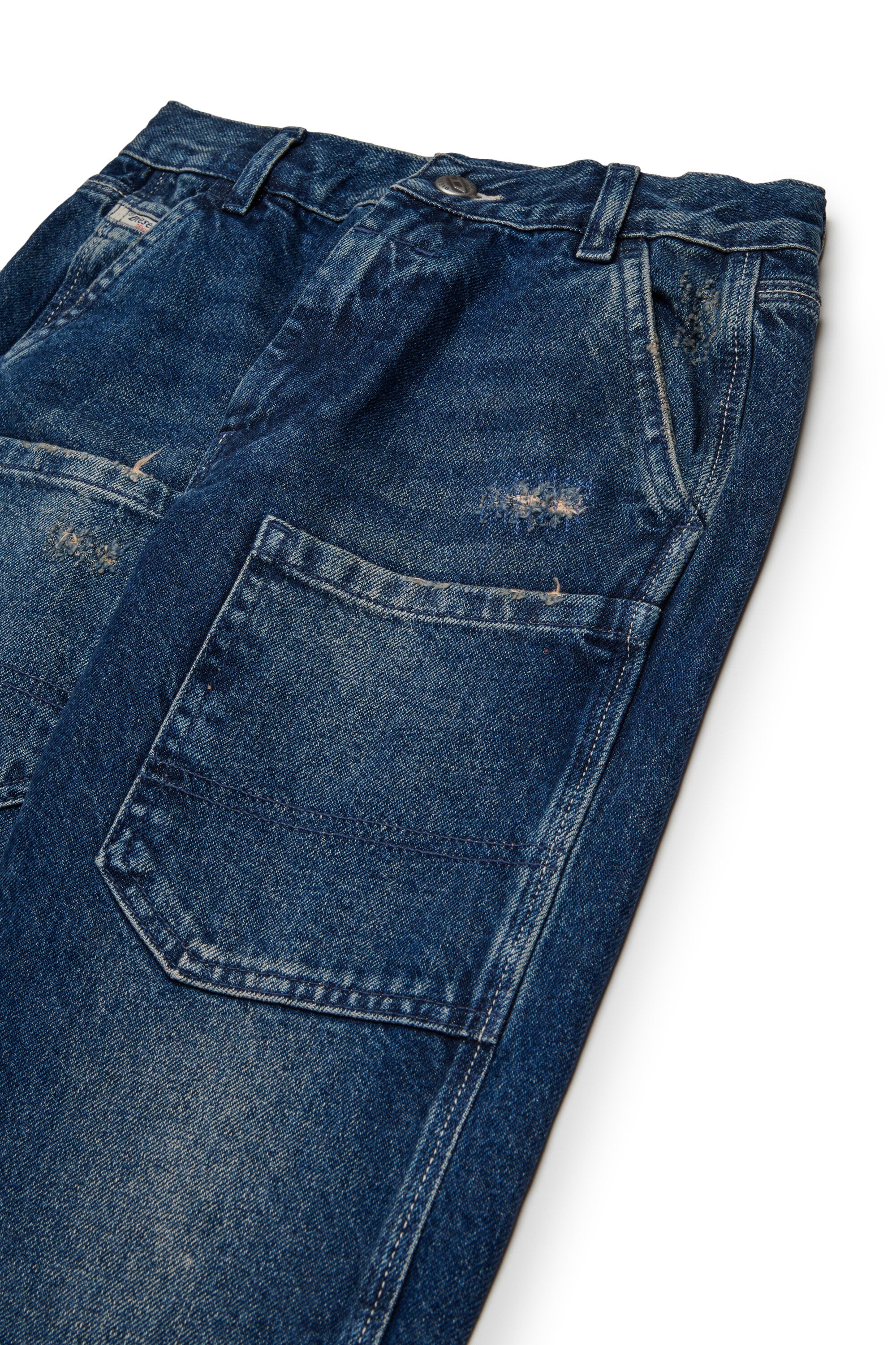 ダーティー加工が施された濃紺のレギュラージーンズ - D-Berr