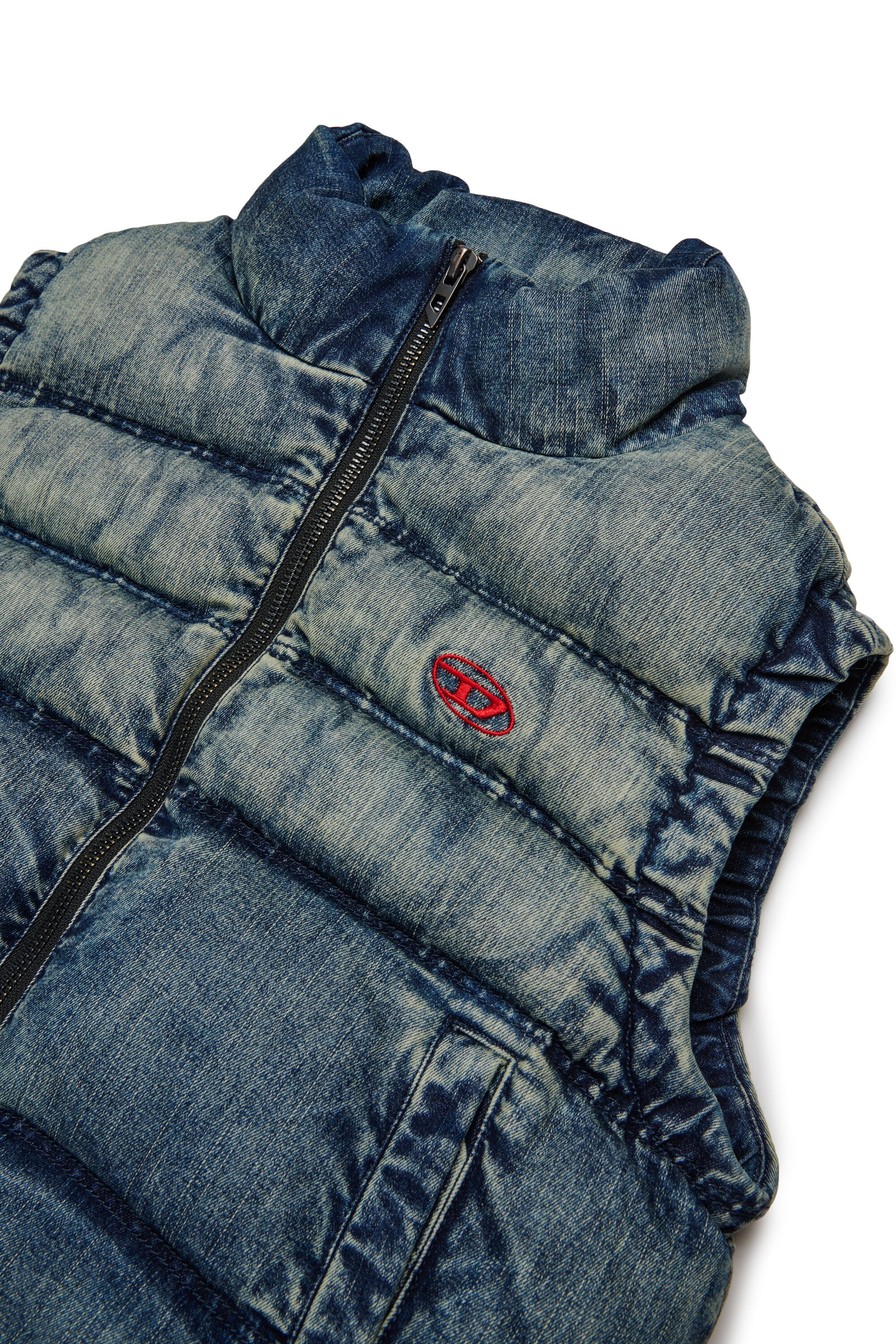 Short padded vest in dirty effect denim