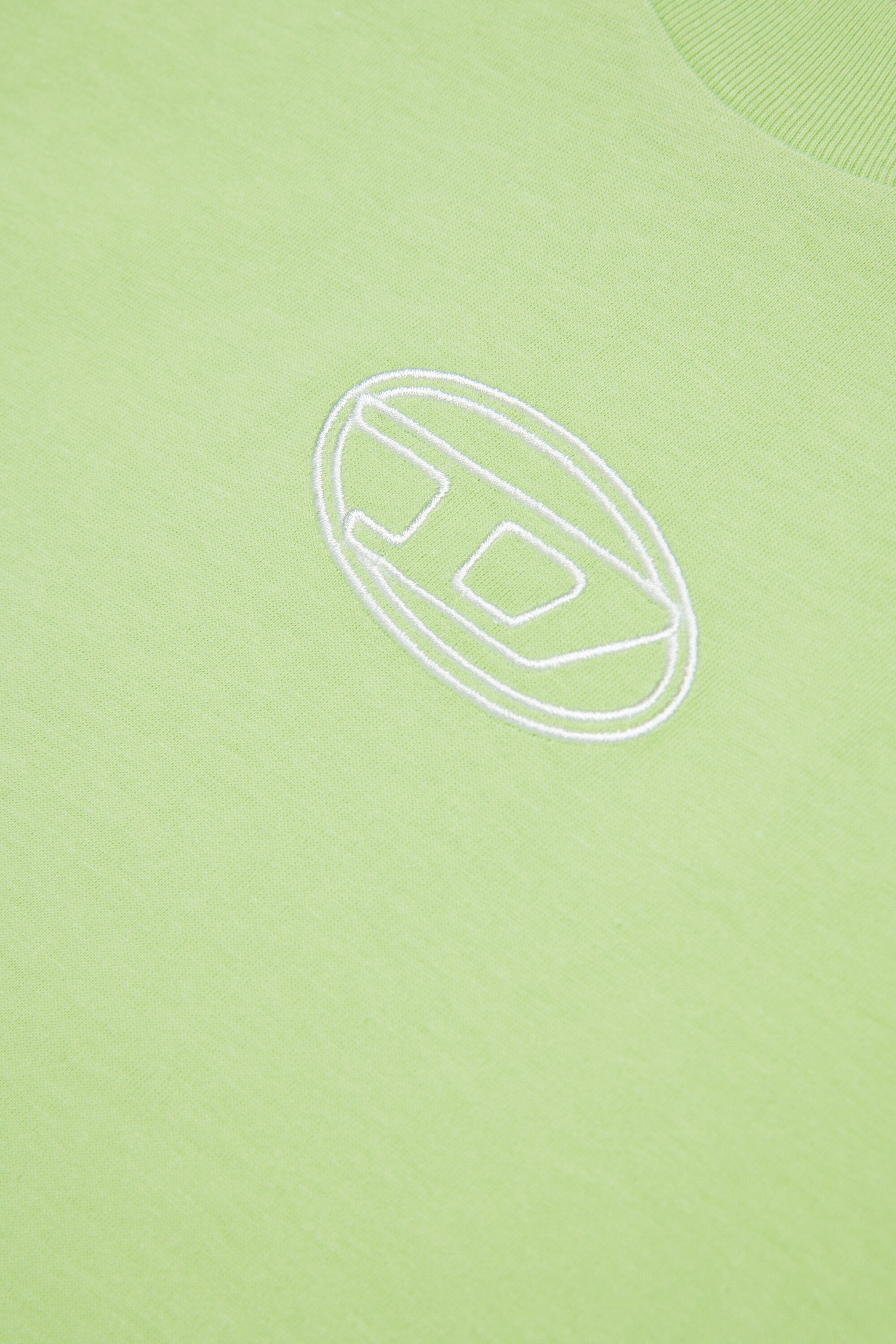 オーバルDのロゴが入ったボクシーなジャージー素材Tシャツ