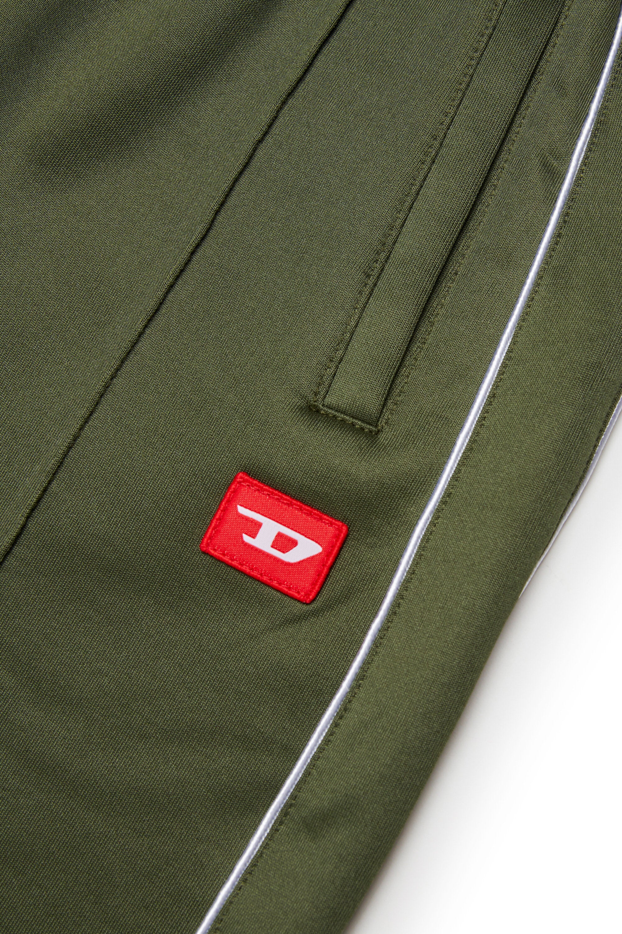 Triacetate balloon pants with red D patch