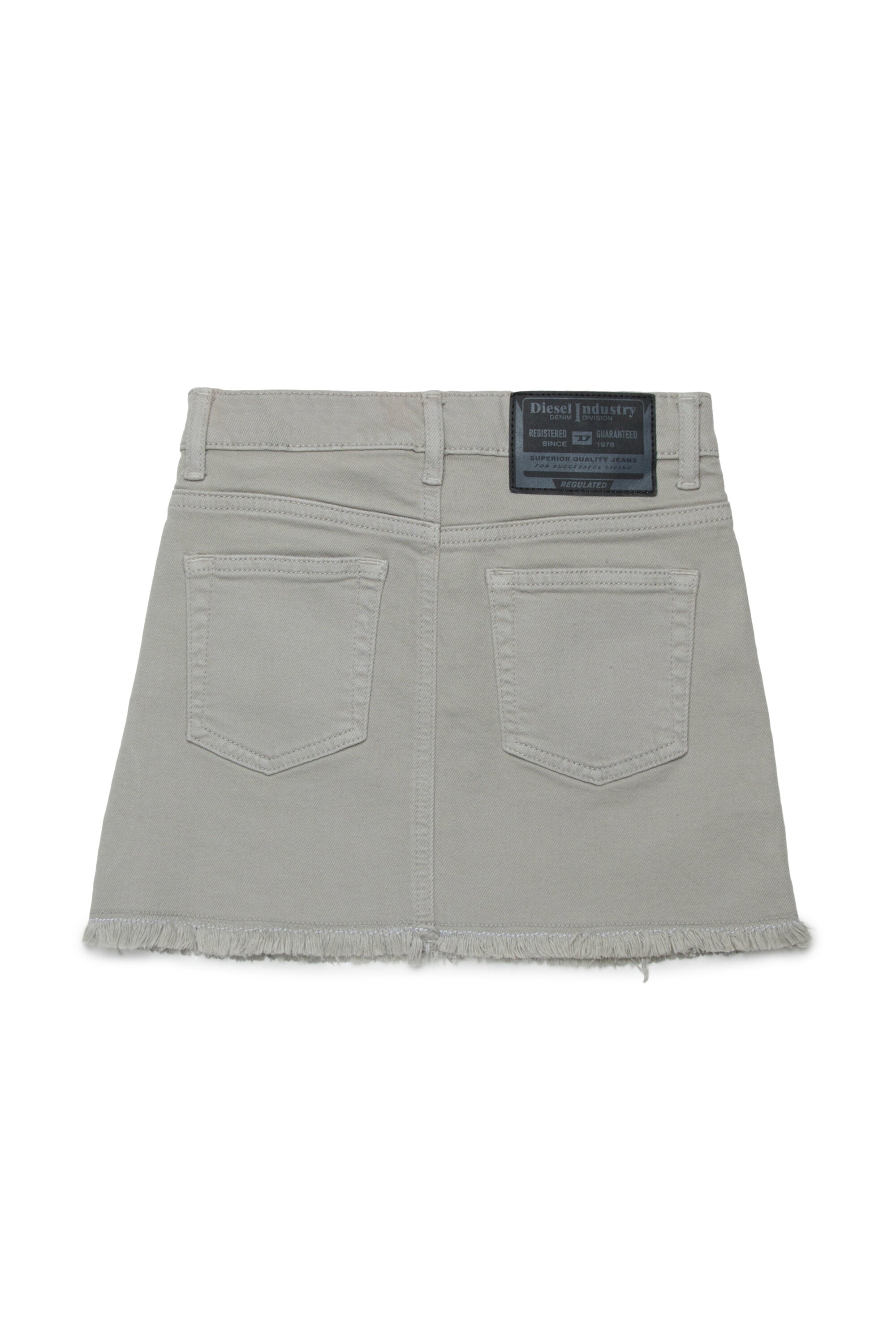 Laminated mini skirt with a fringed effect