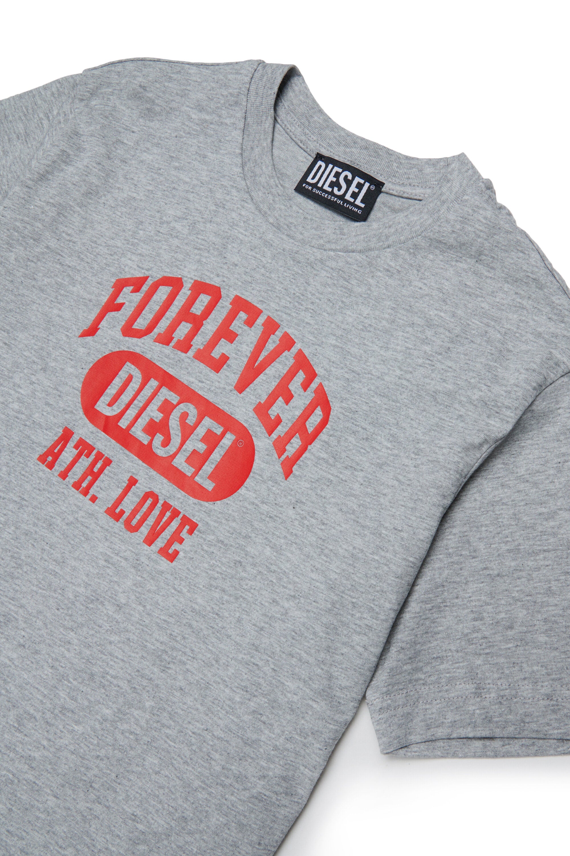 ロゴ入りTシャツ