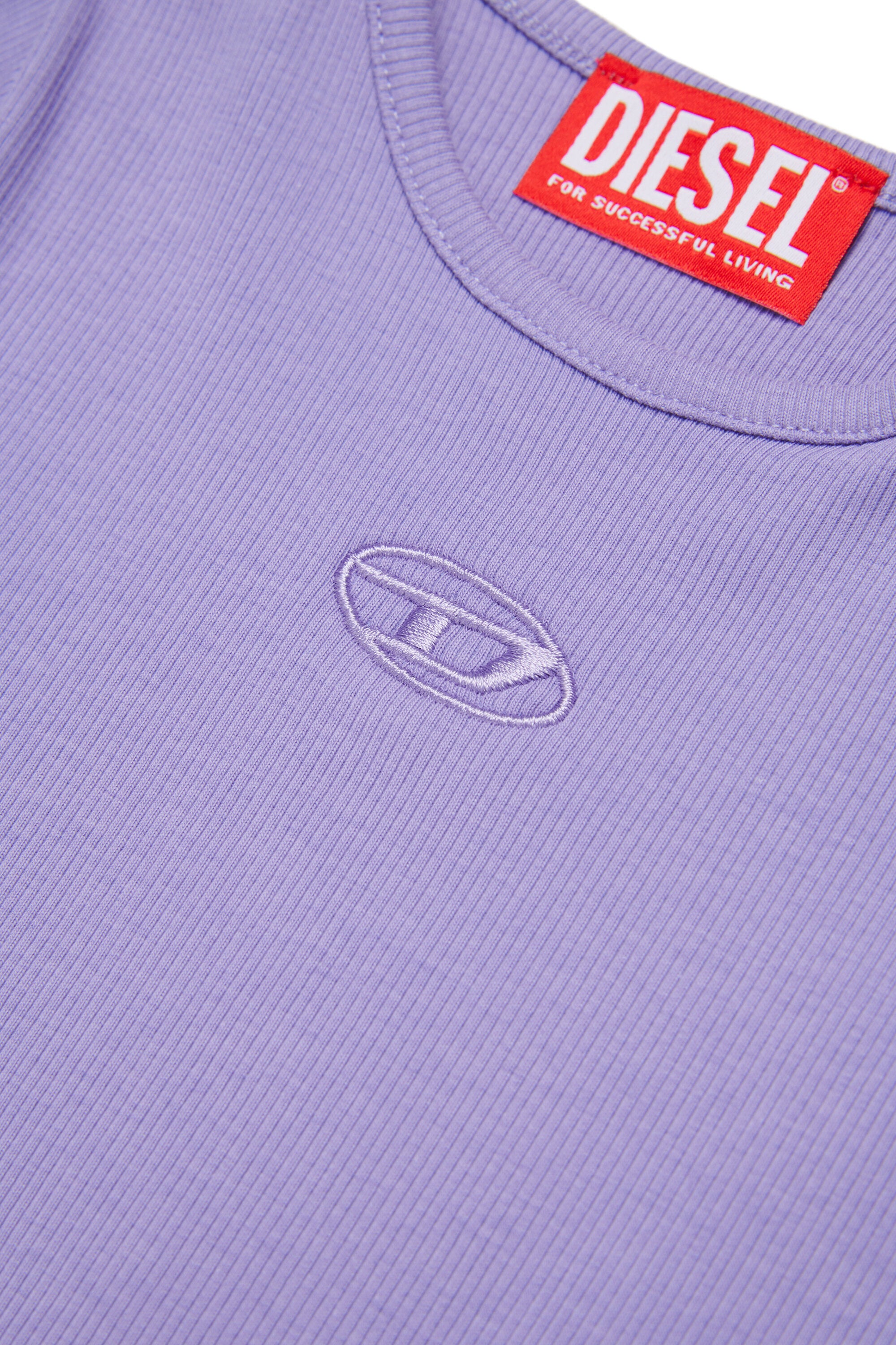 ロゴ入りTシャツ
