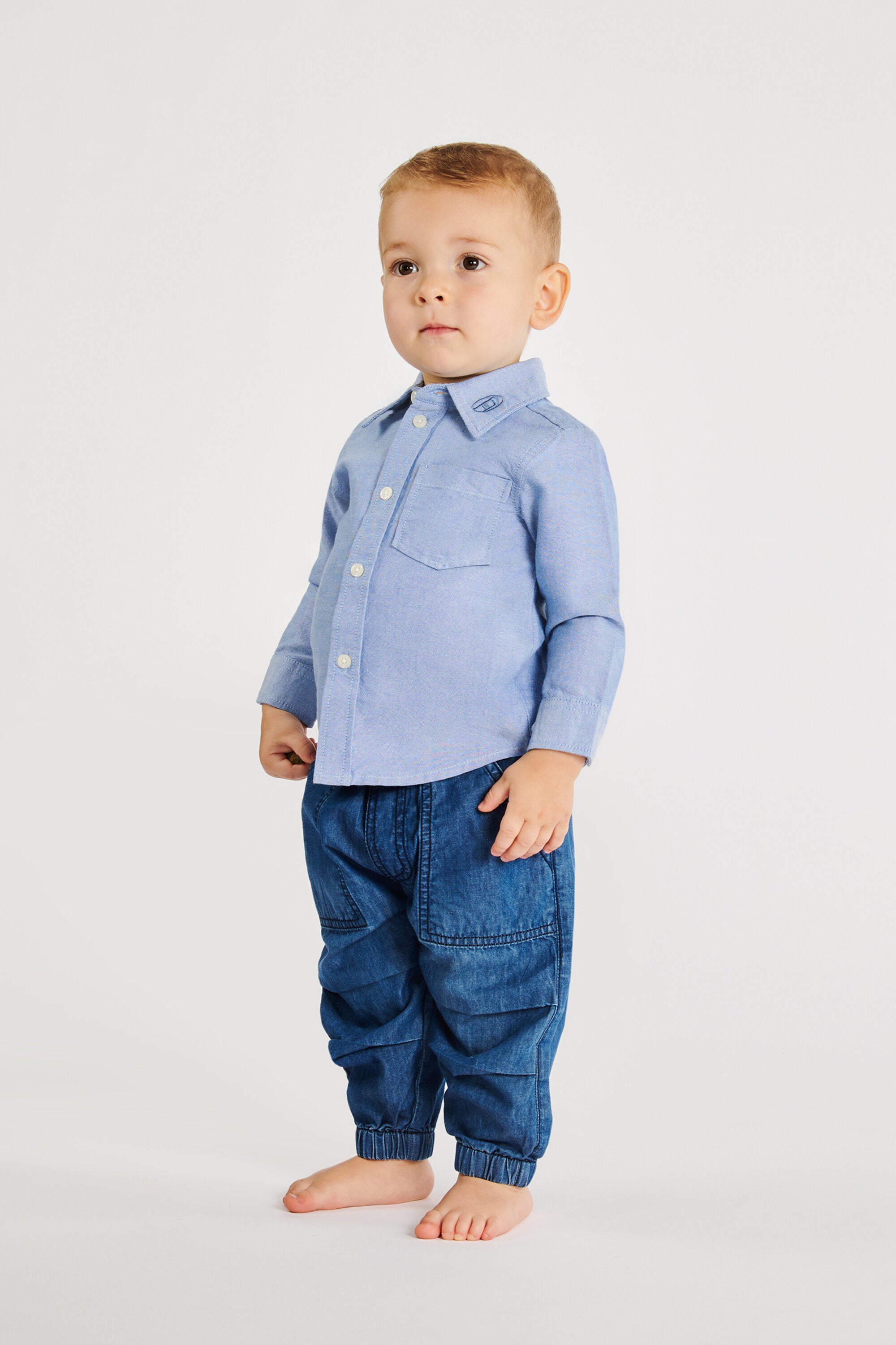 ロゴ付き長袖シャツ