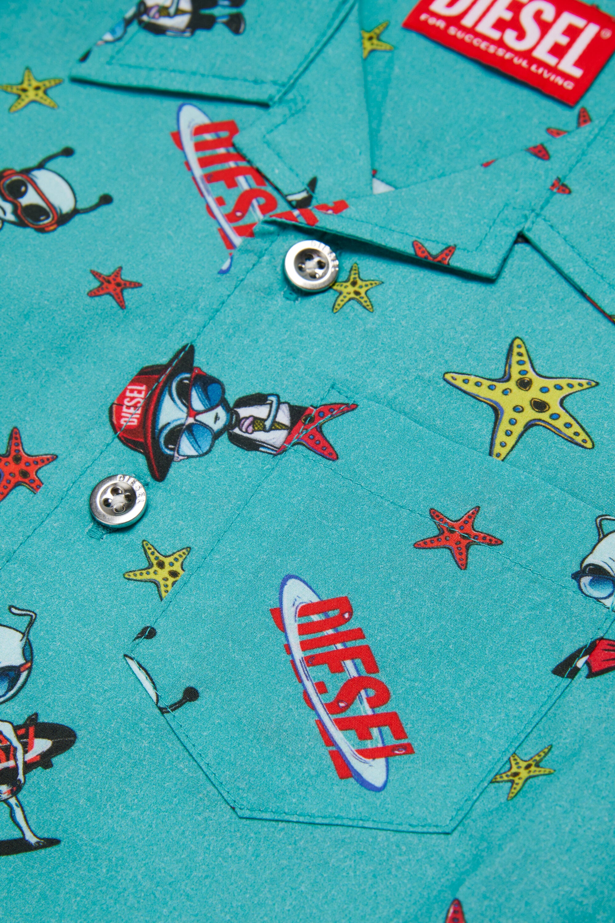 ロゴ入り半袖シャツ