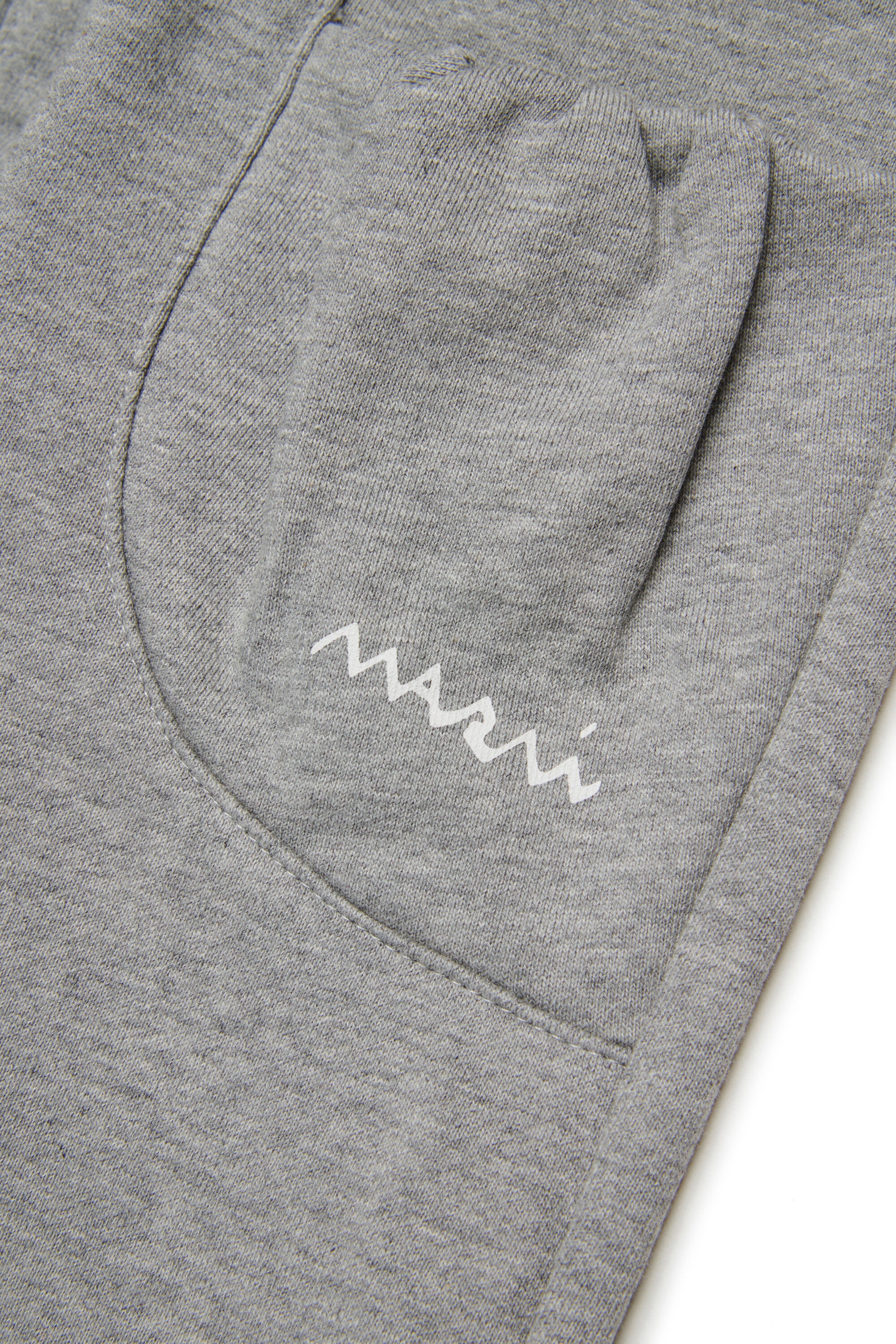 Fleece jogger pants with ruffled pockets