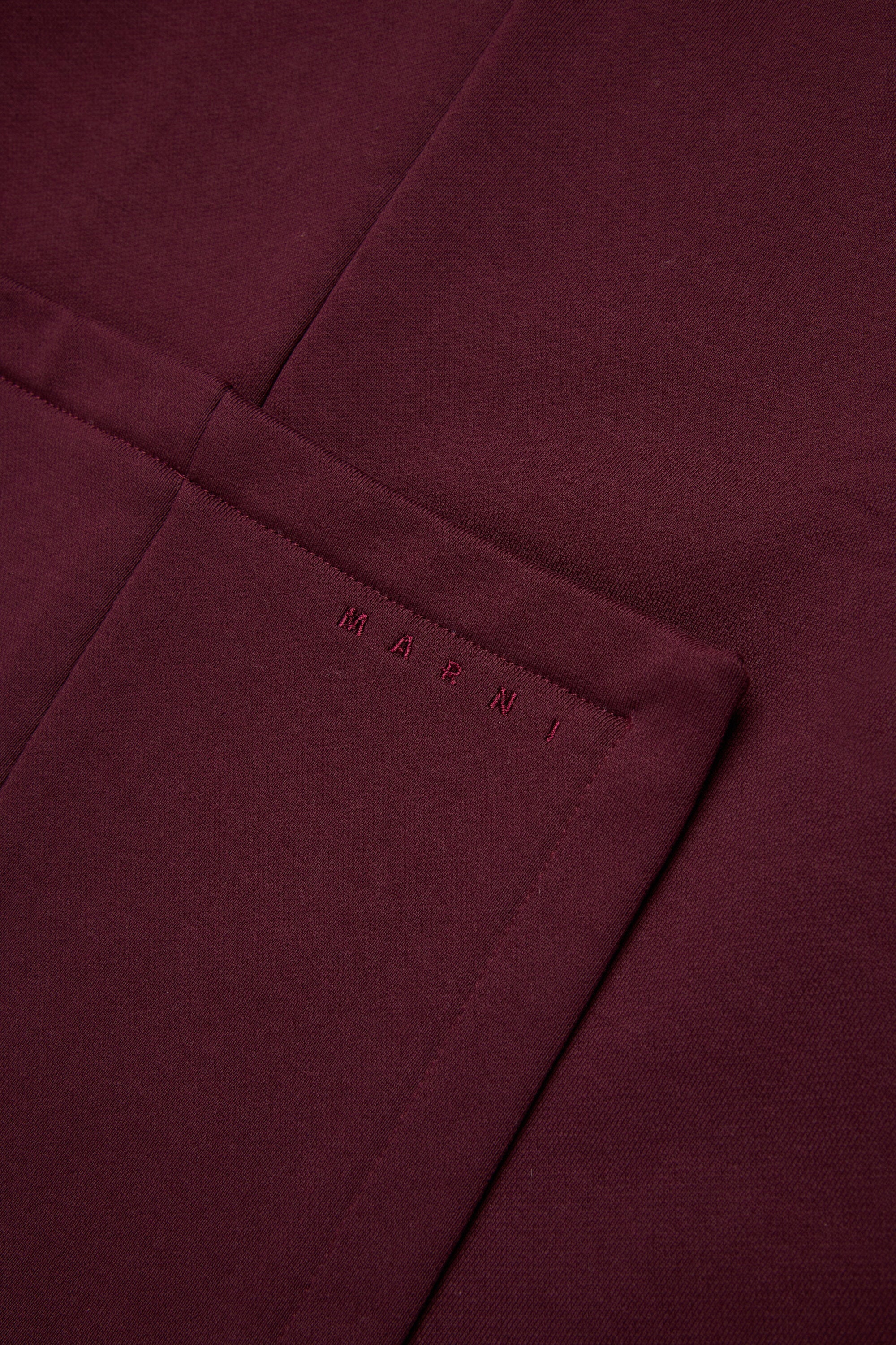 パッチポケット付きクルーネックスウェットシャツ