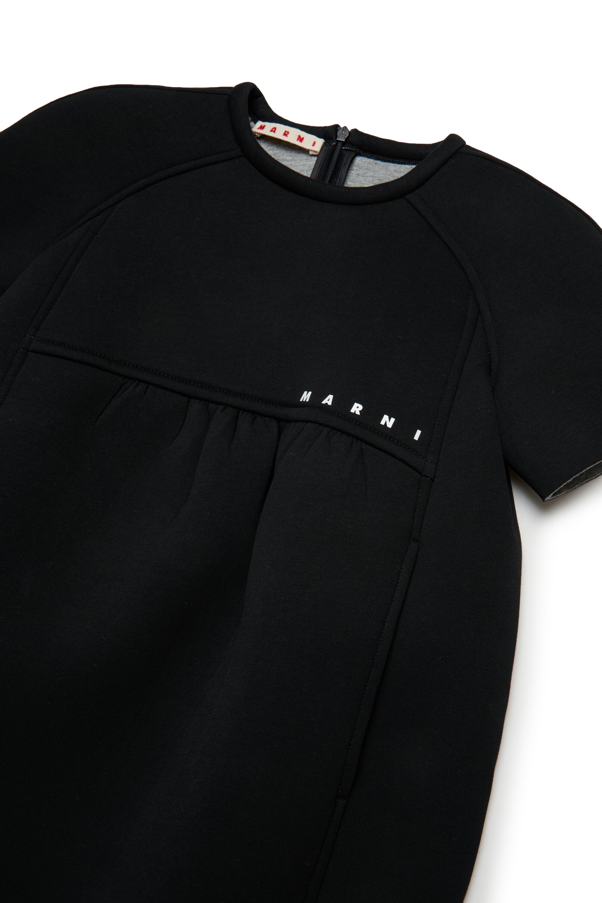 ネオプレン製卵型ミニドレス