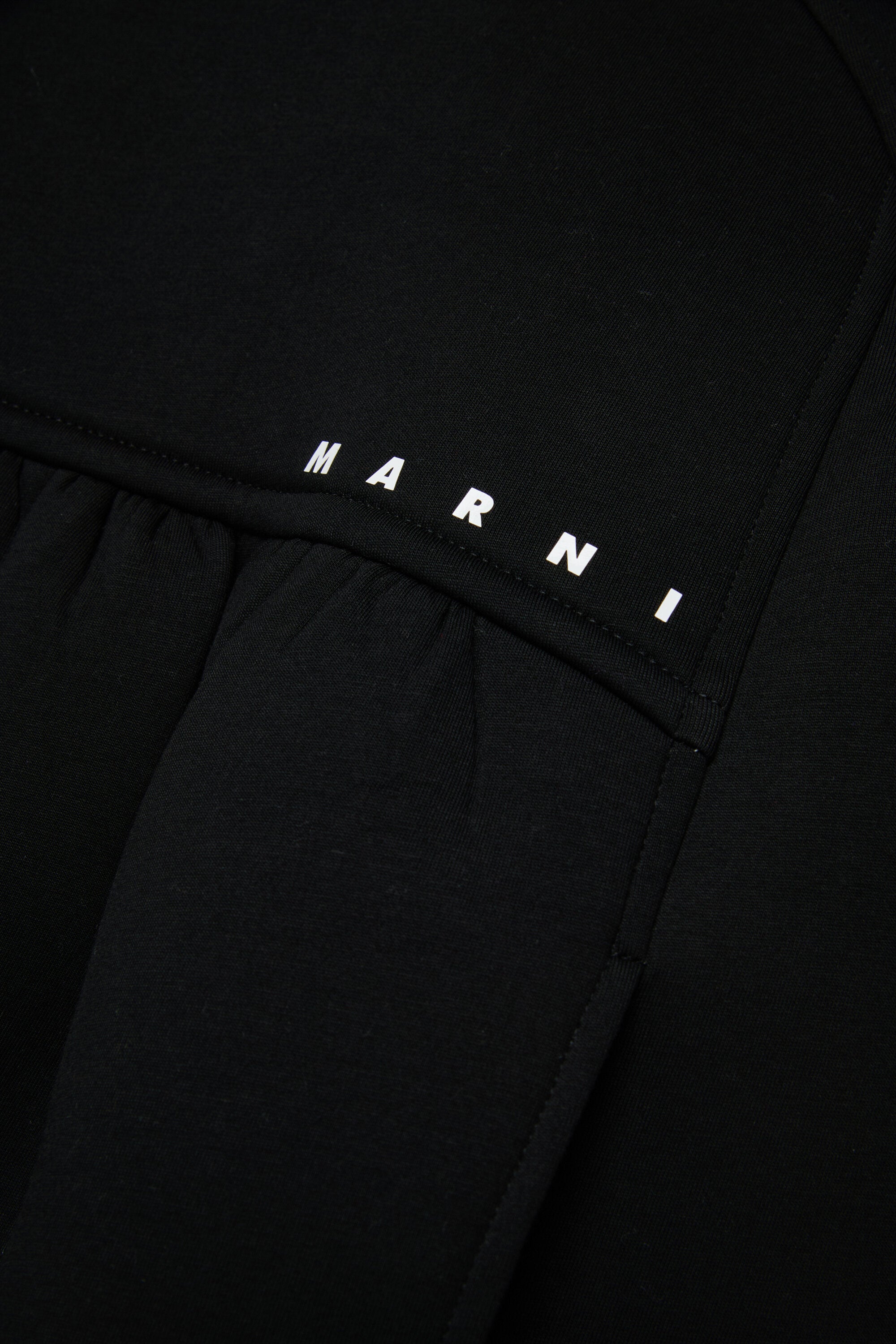 ネオプレン製卵型ミニドレス