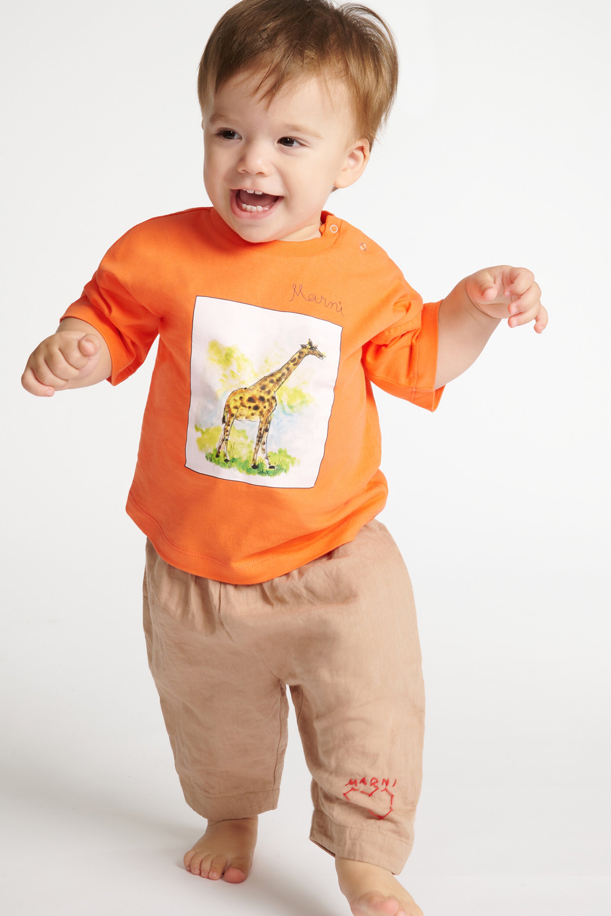 T-shirt with giraffe print and logo