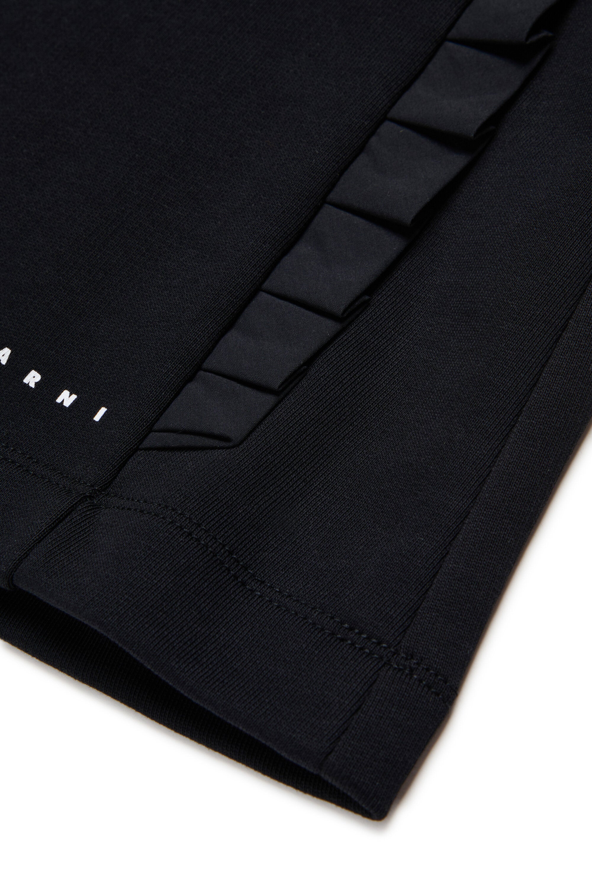 Mini skirt with pleated details