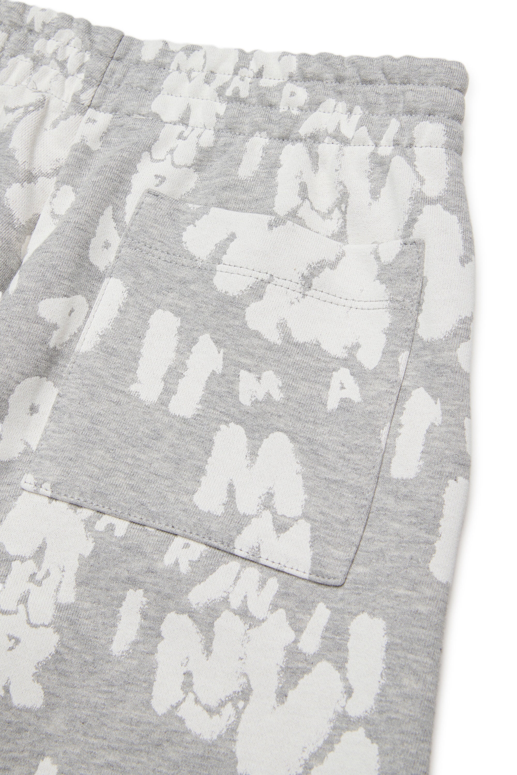 ロゴ総柄スウェットパンツ