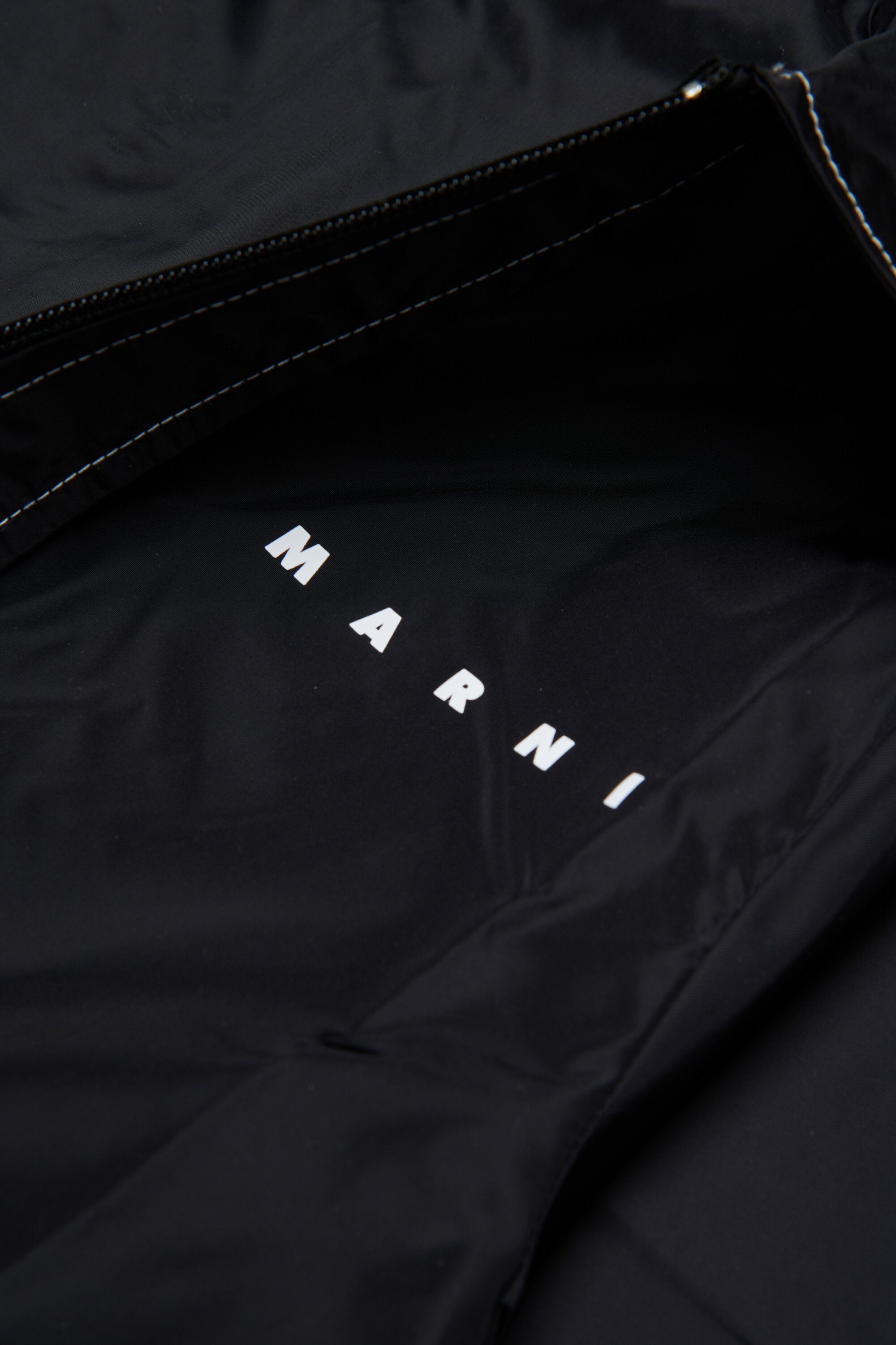 ロゴプリント入りロングジャケット