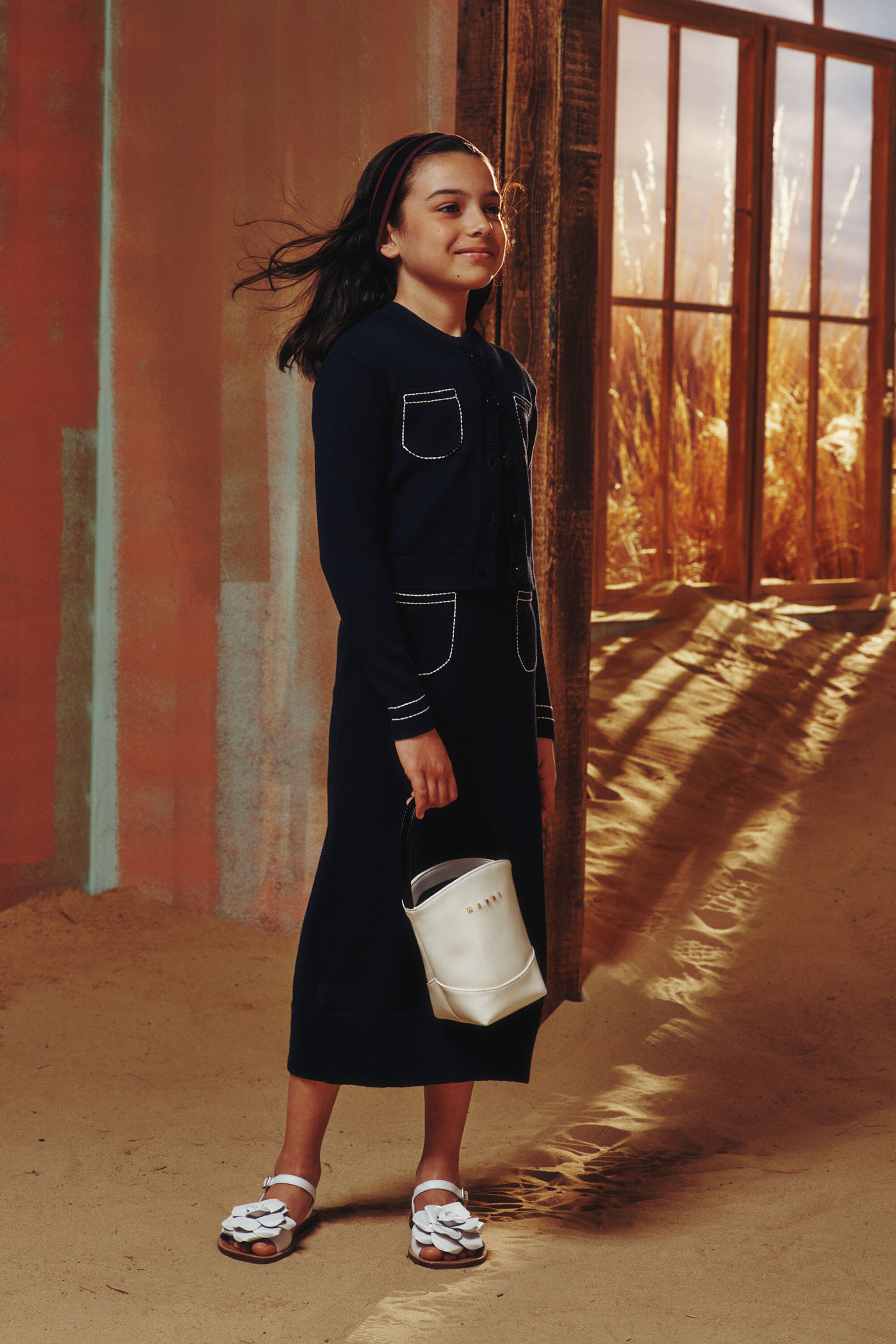 ロゴ入りニットカーディガン