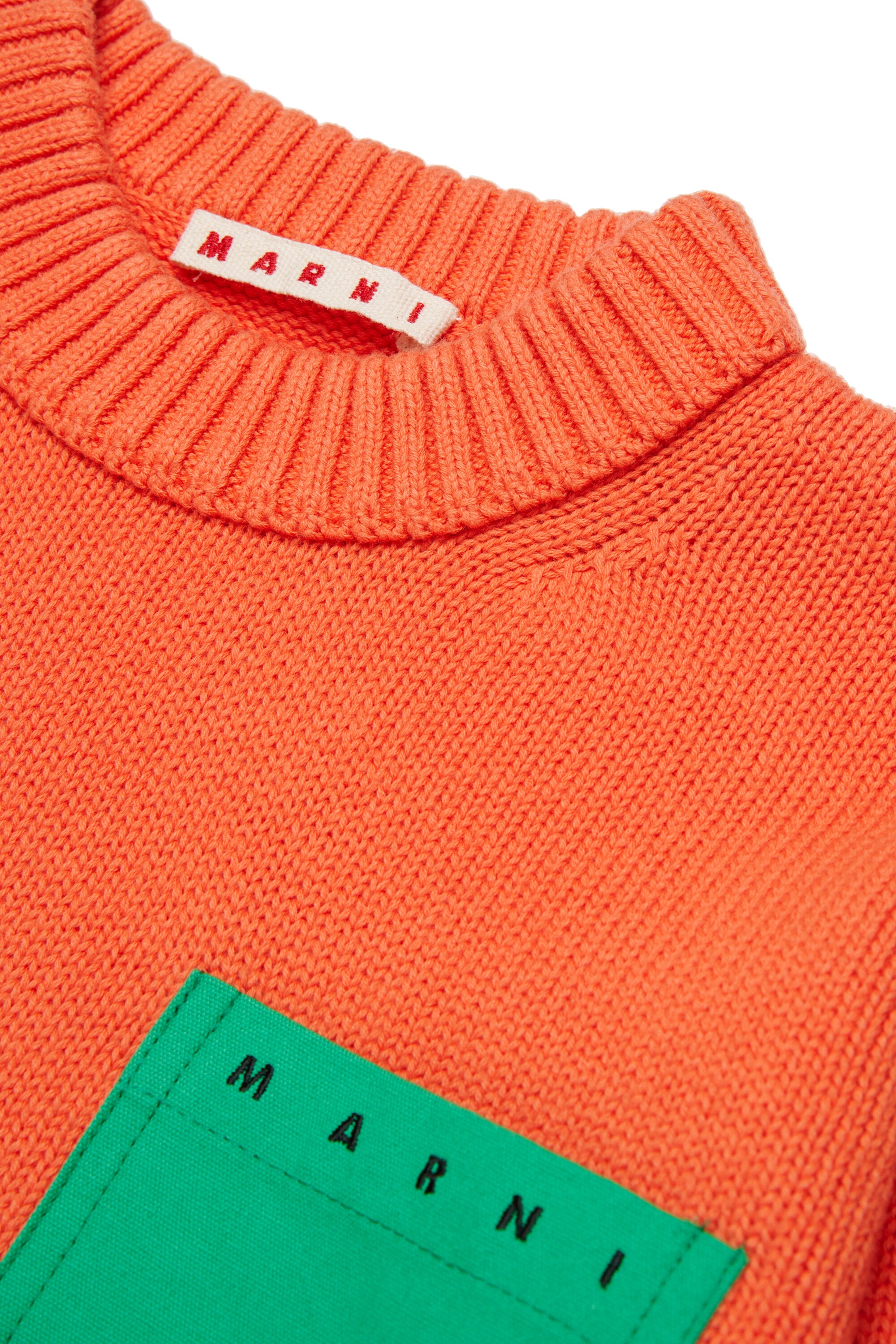 Crew neck pullover with chest pocket and logo