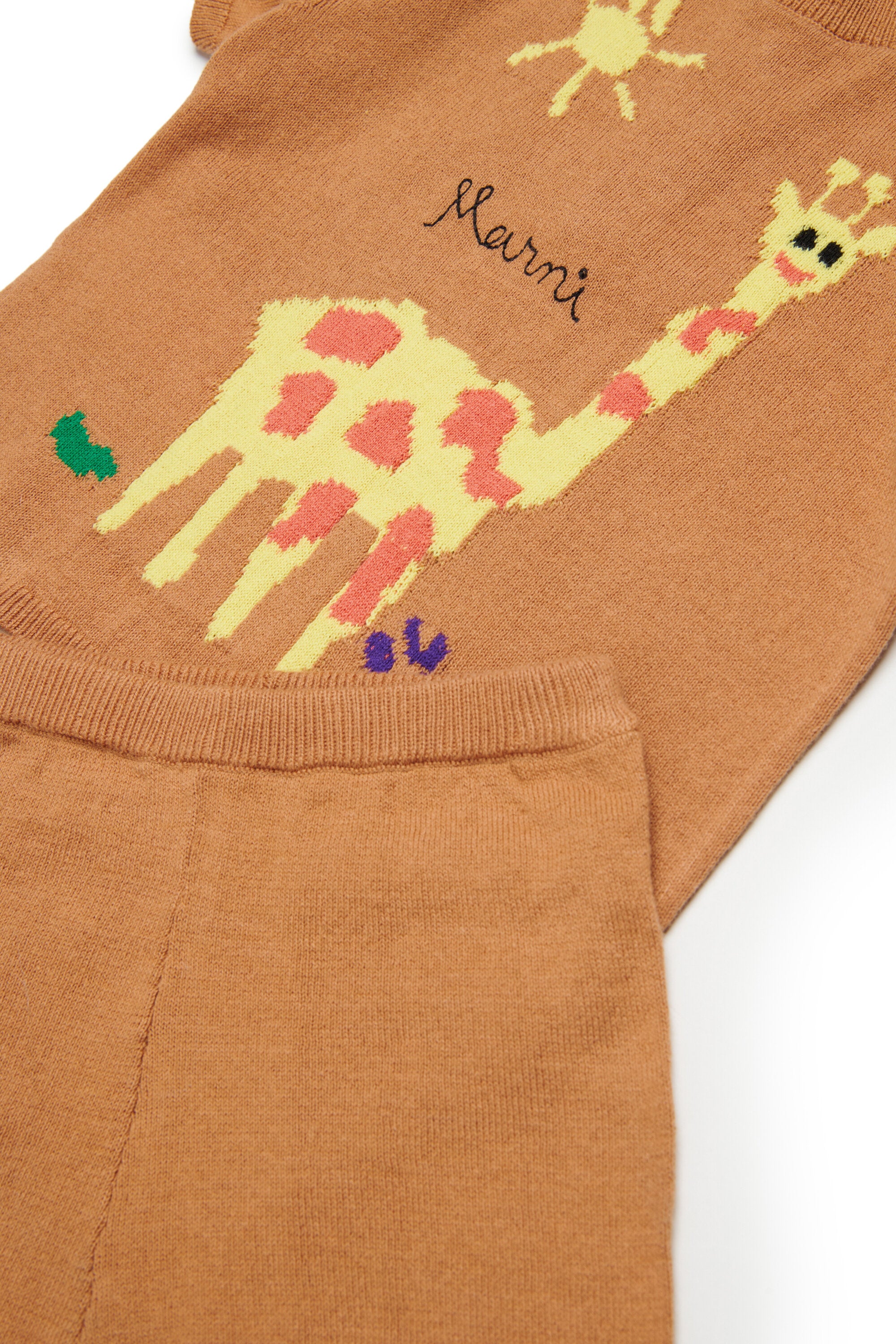 ジャカード生地のキリン柄ベビーロンパース