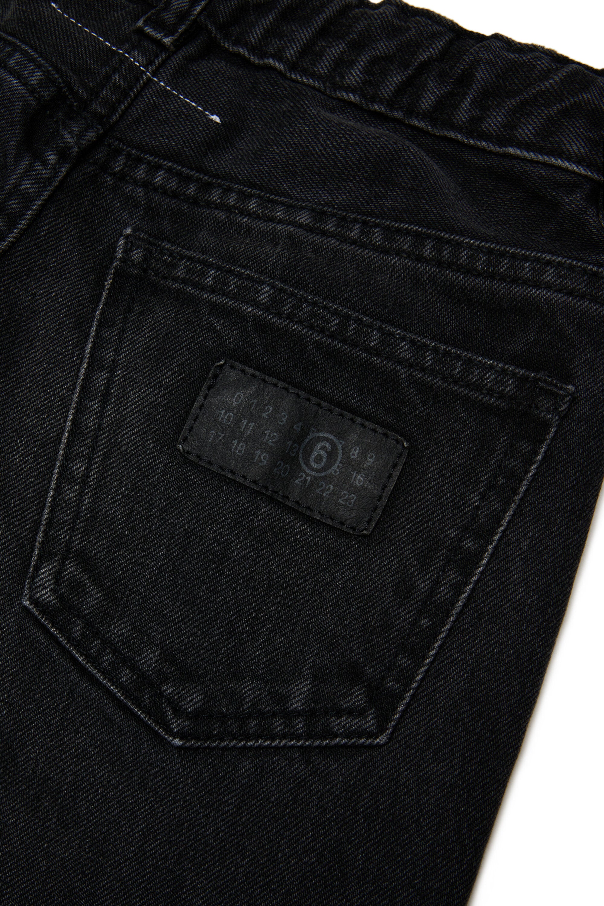 Flared jeans with used effect