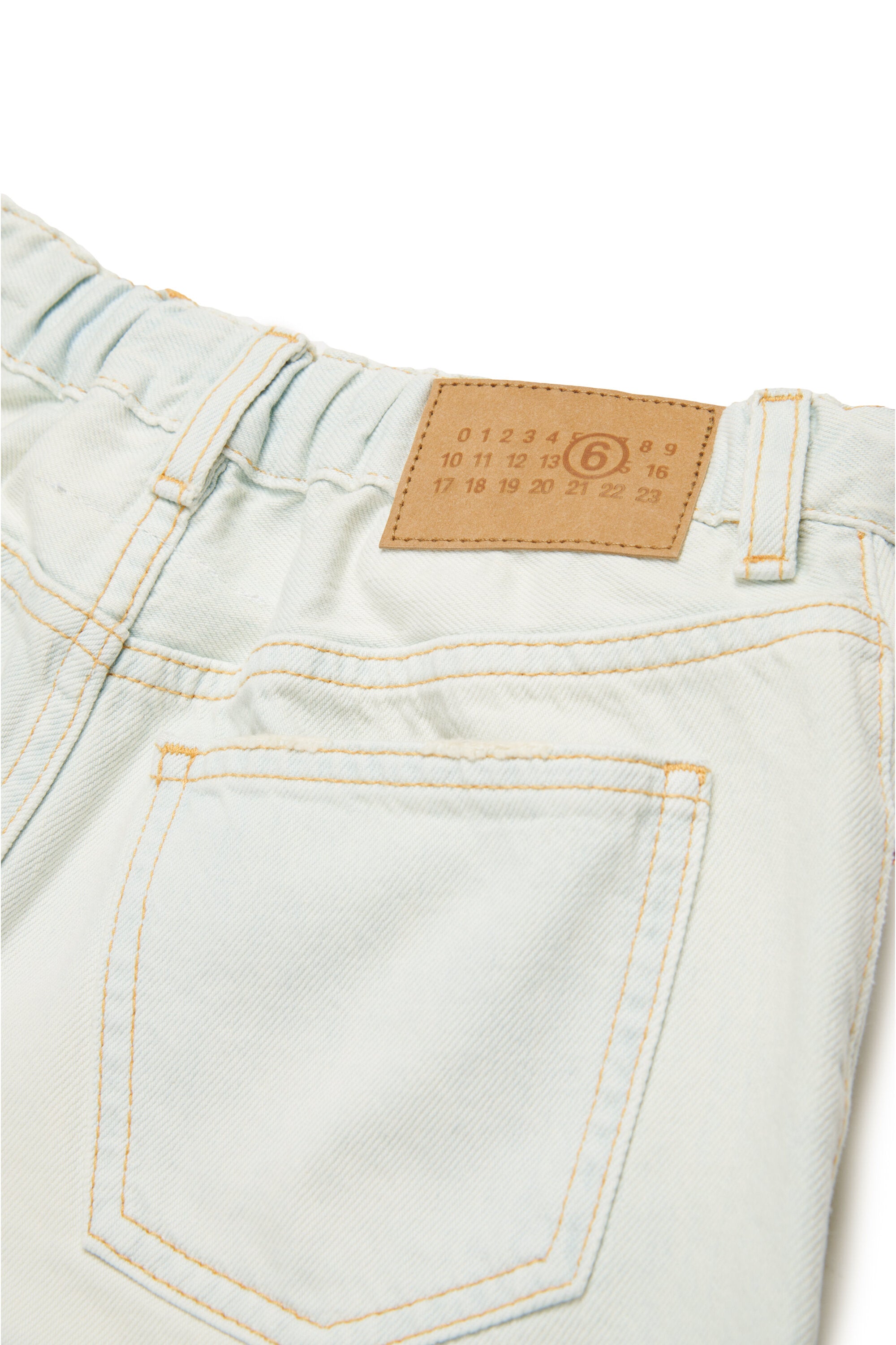 Light worn-effect denim shorts