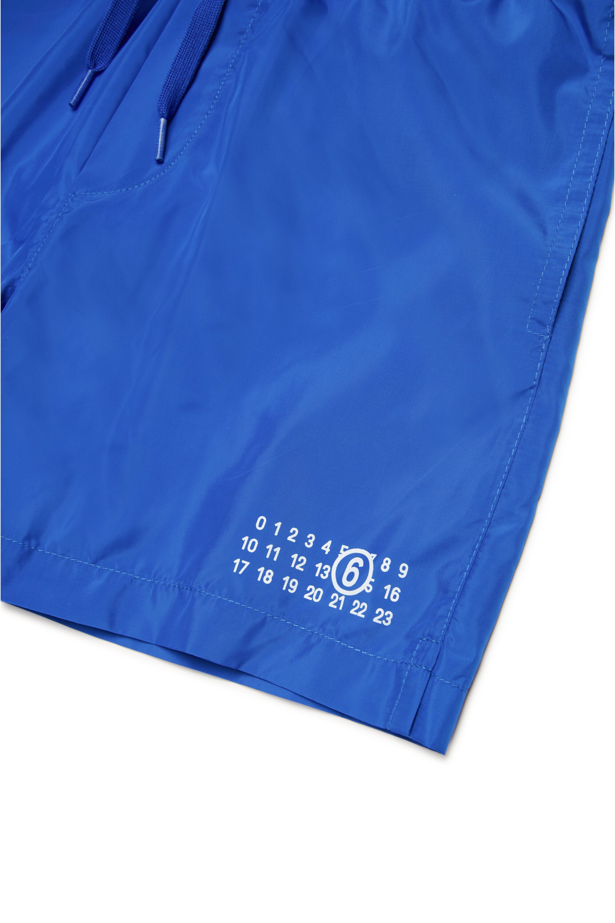 Boxer swimsuit branded with Numeric logo