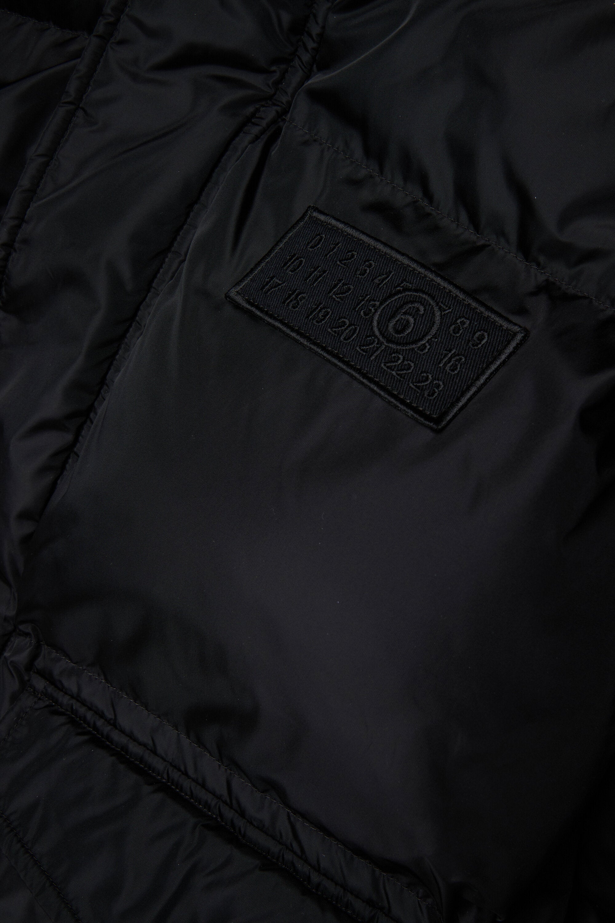 ポケット付きロング・ジャケット