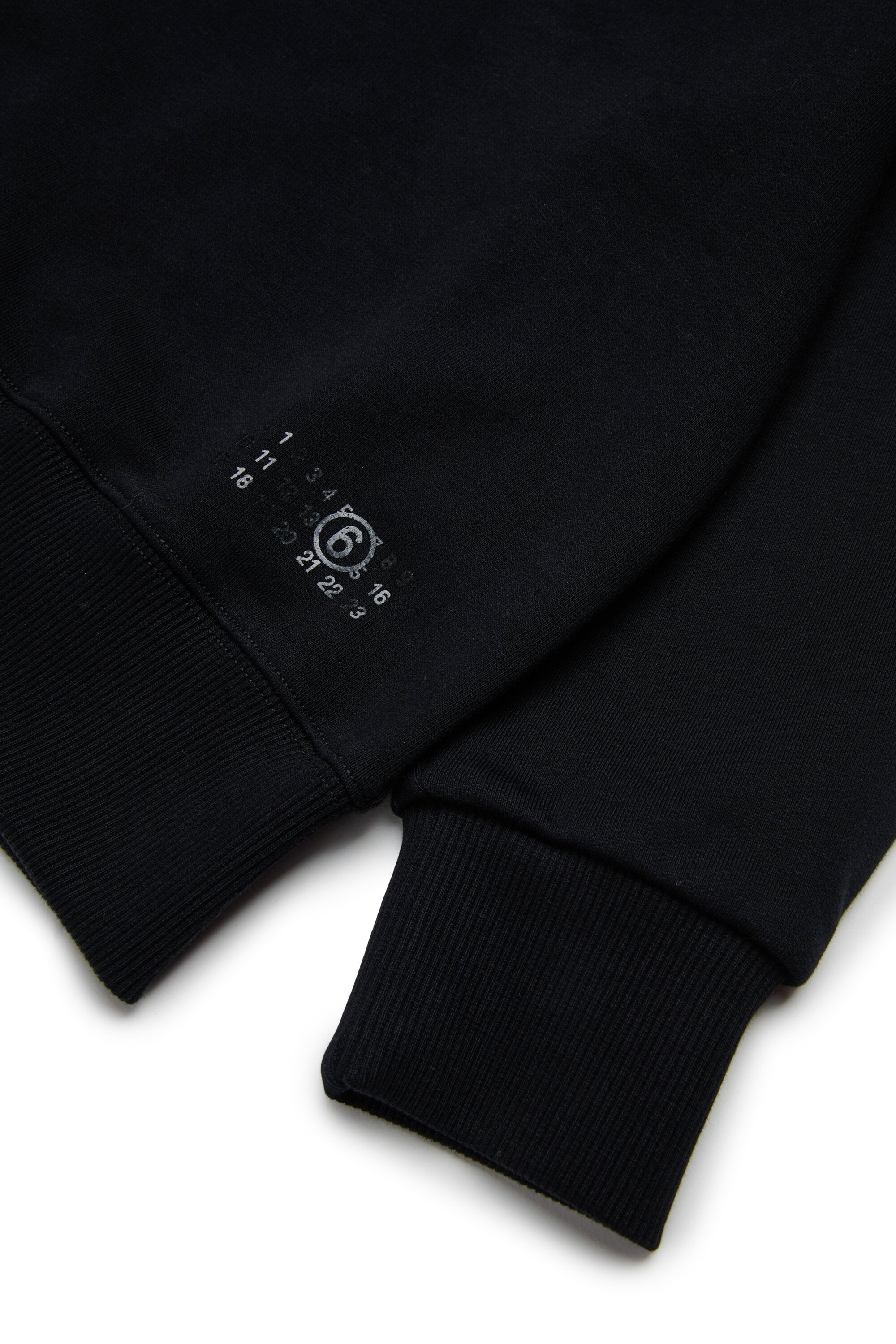 光沢のある筆使いのフリース・プルオーバー