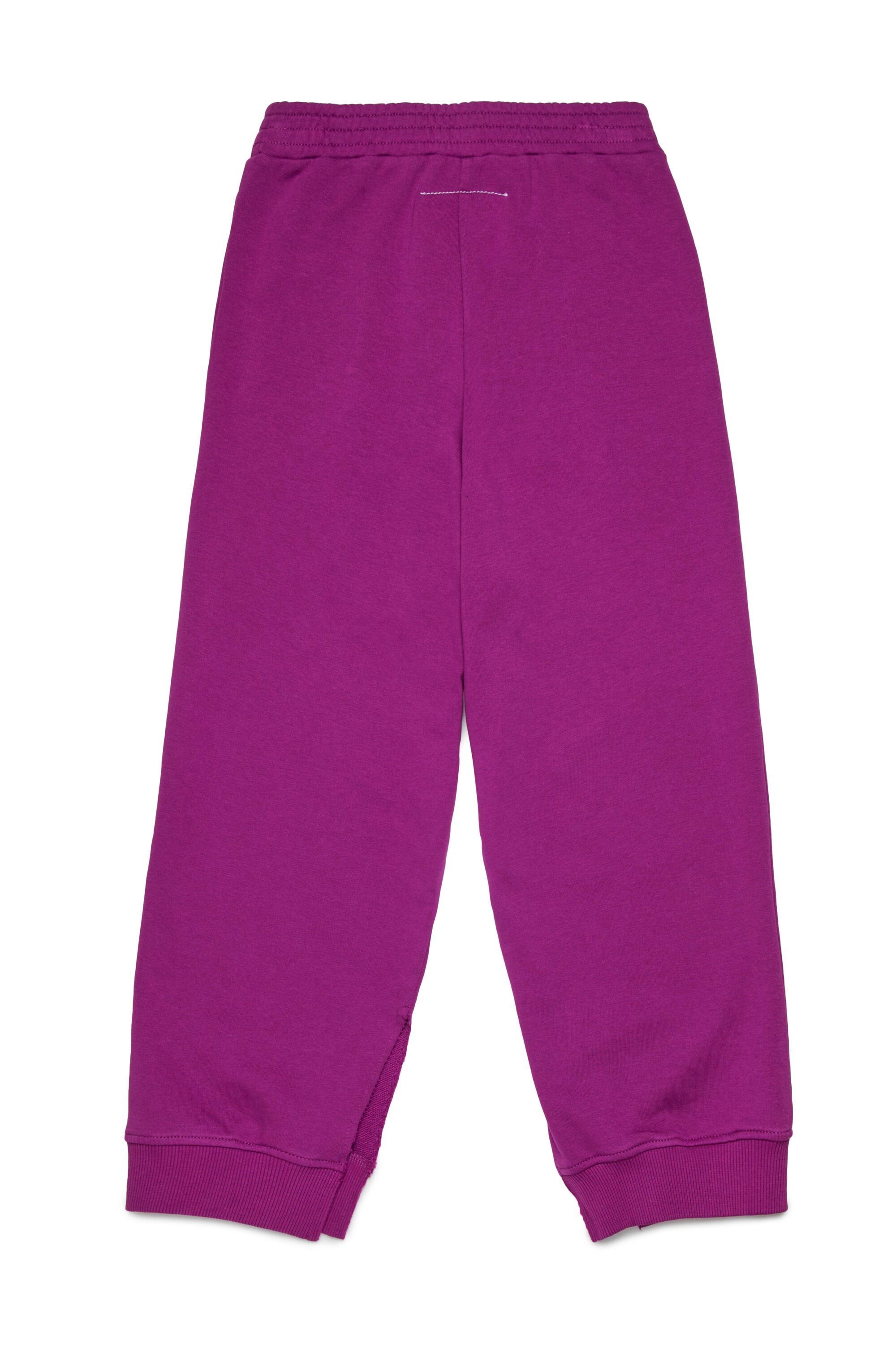 スプリット・ジョガー・パンツにHand Writtenのロゴ入り