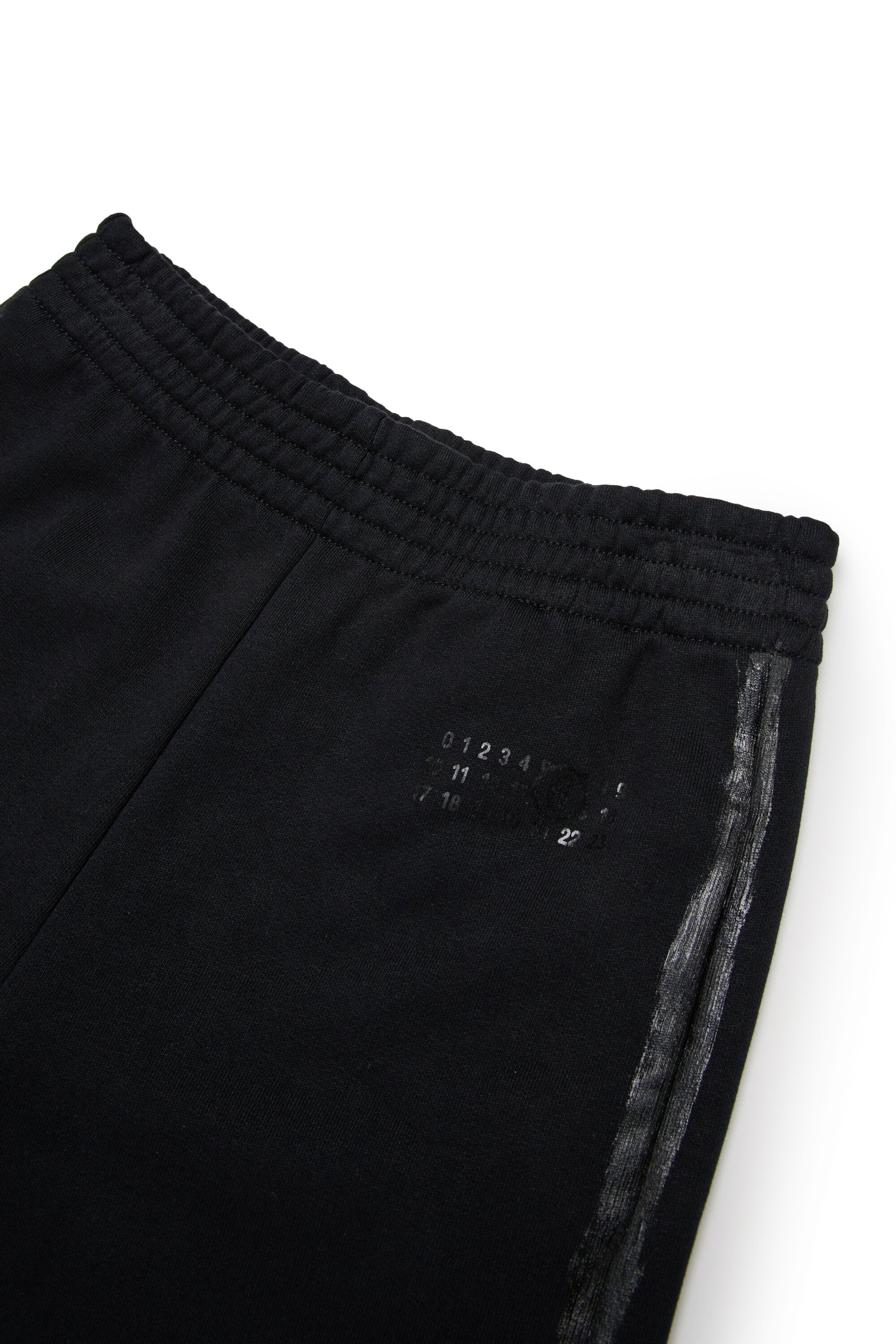 光沢のあるプラッキングのフリースパンツ