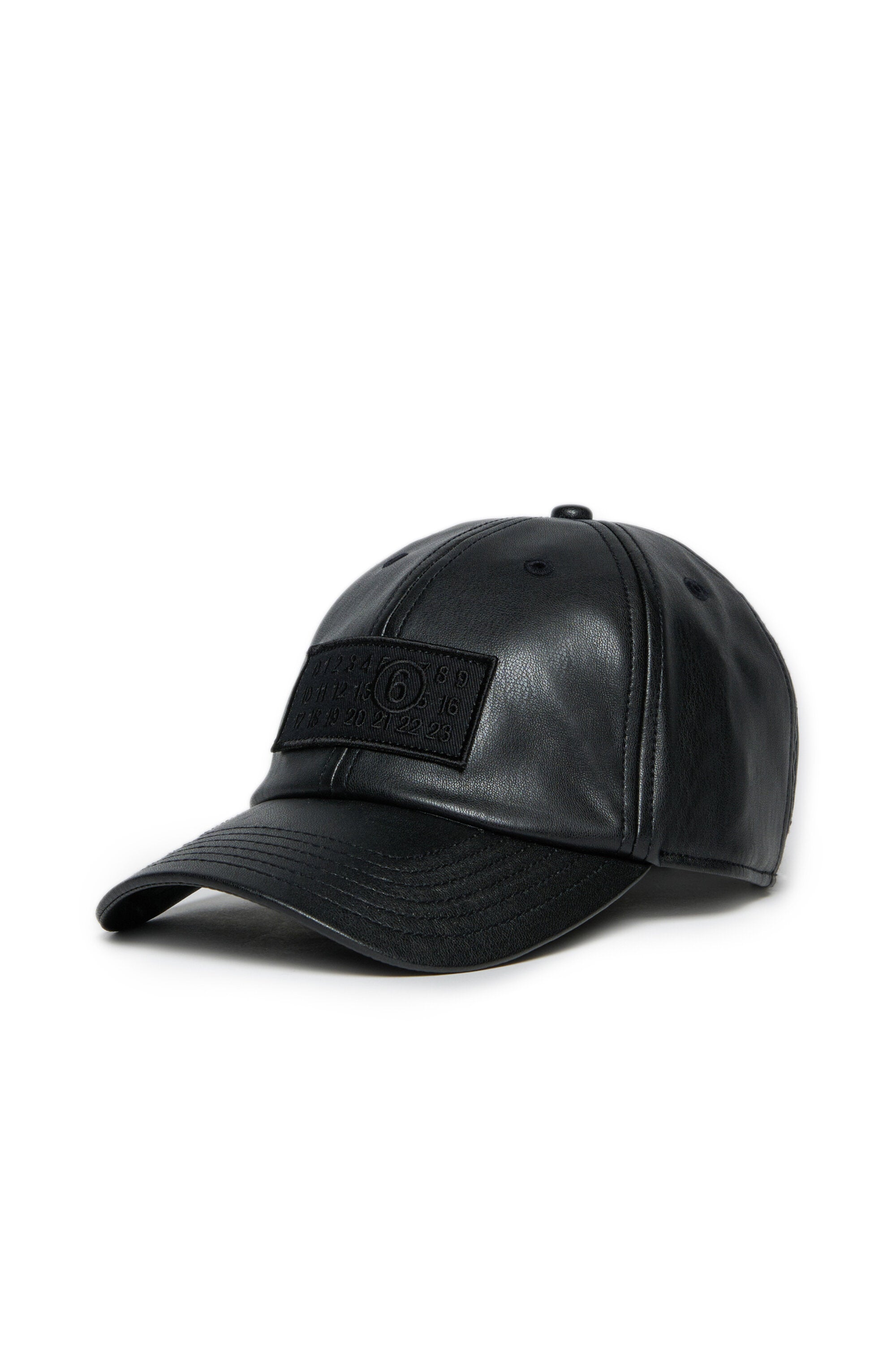 Baseball cap in coated fabric with patch