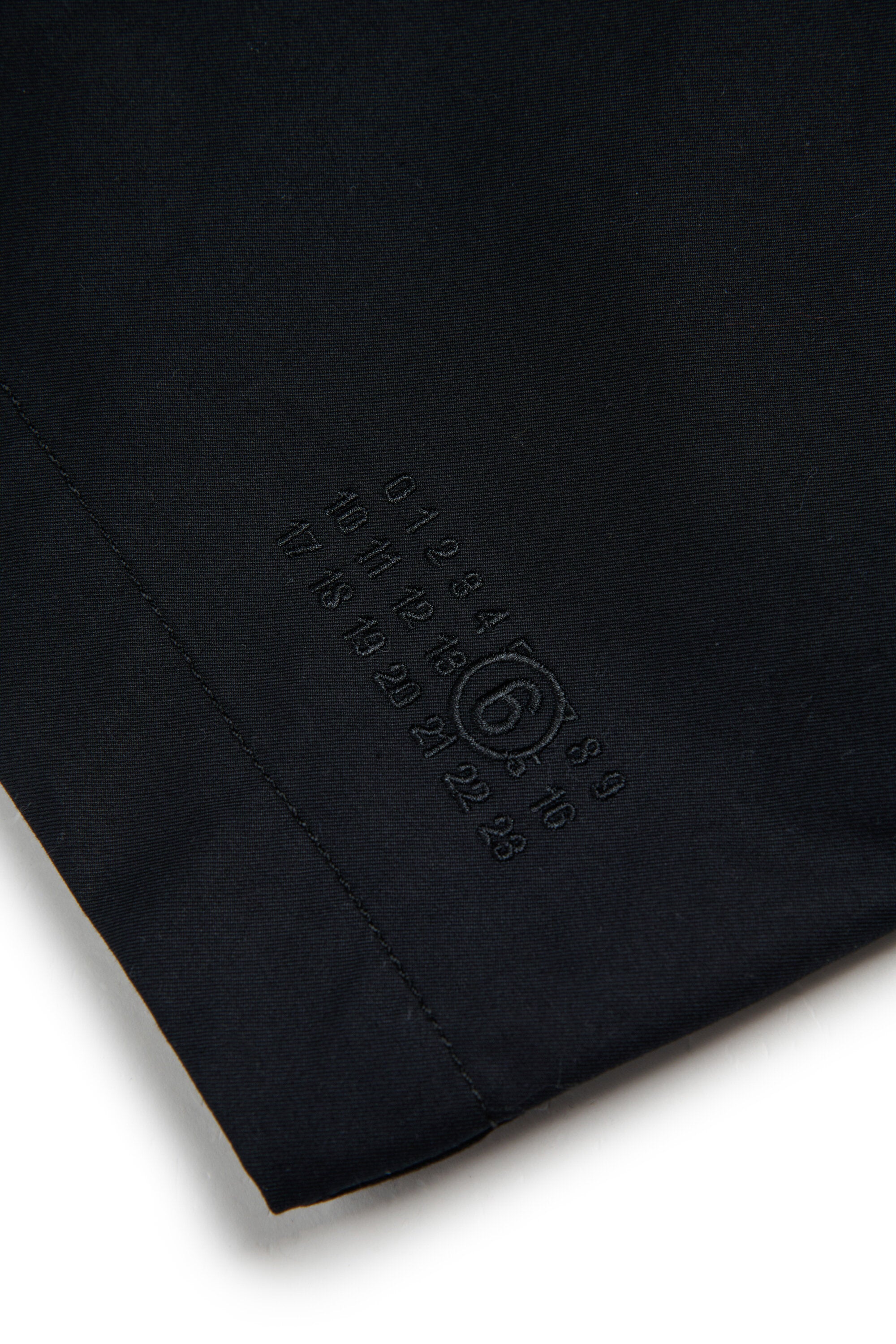 ロゴ入りシングルブレストコート