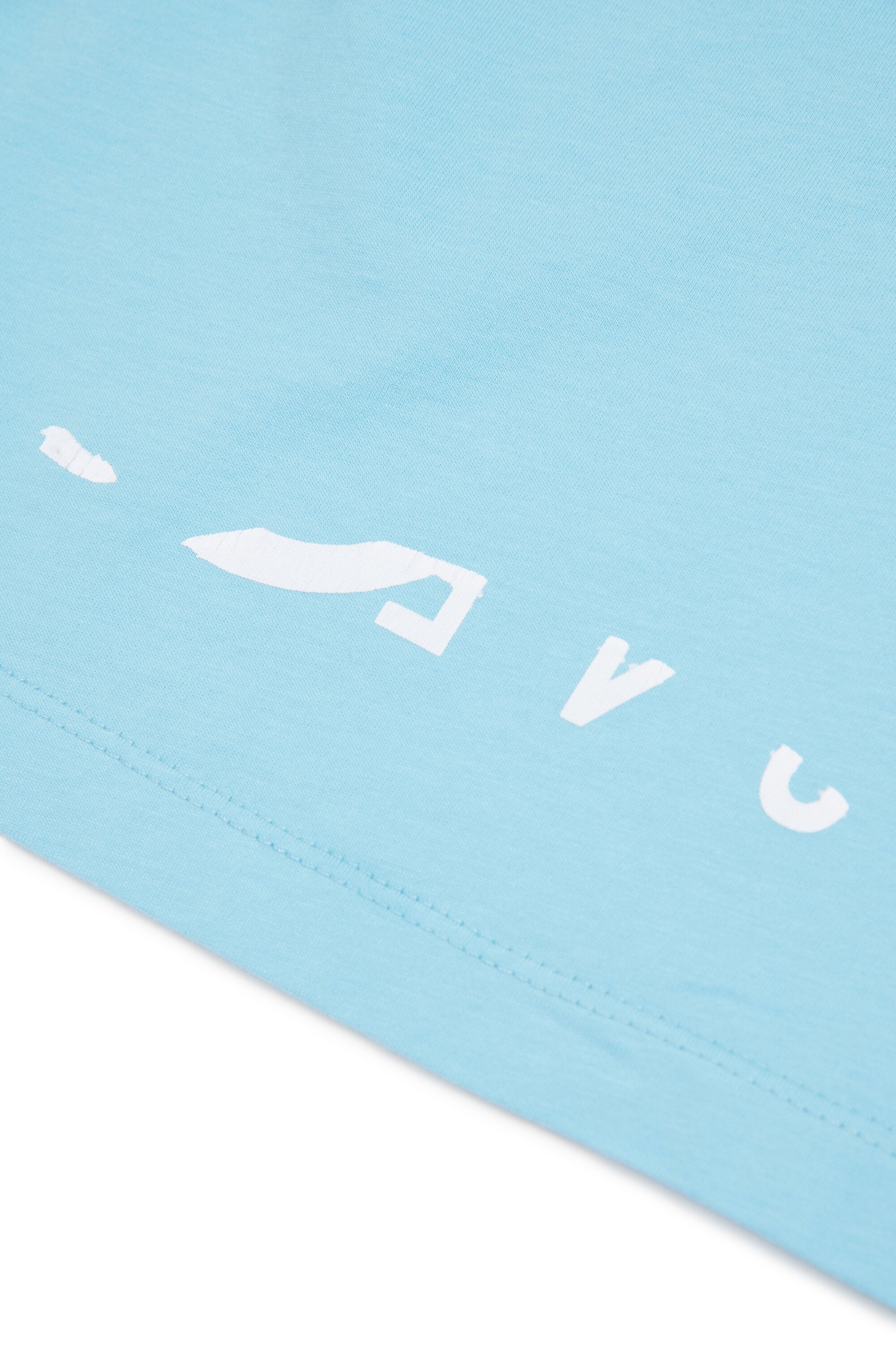 ロゴ入りTシャツ