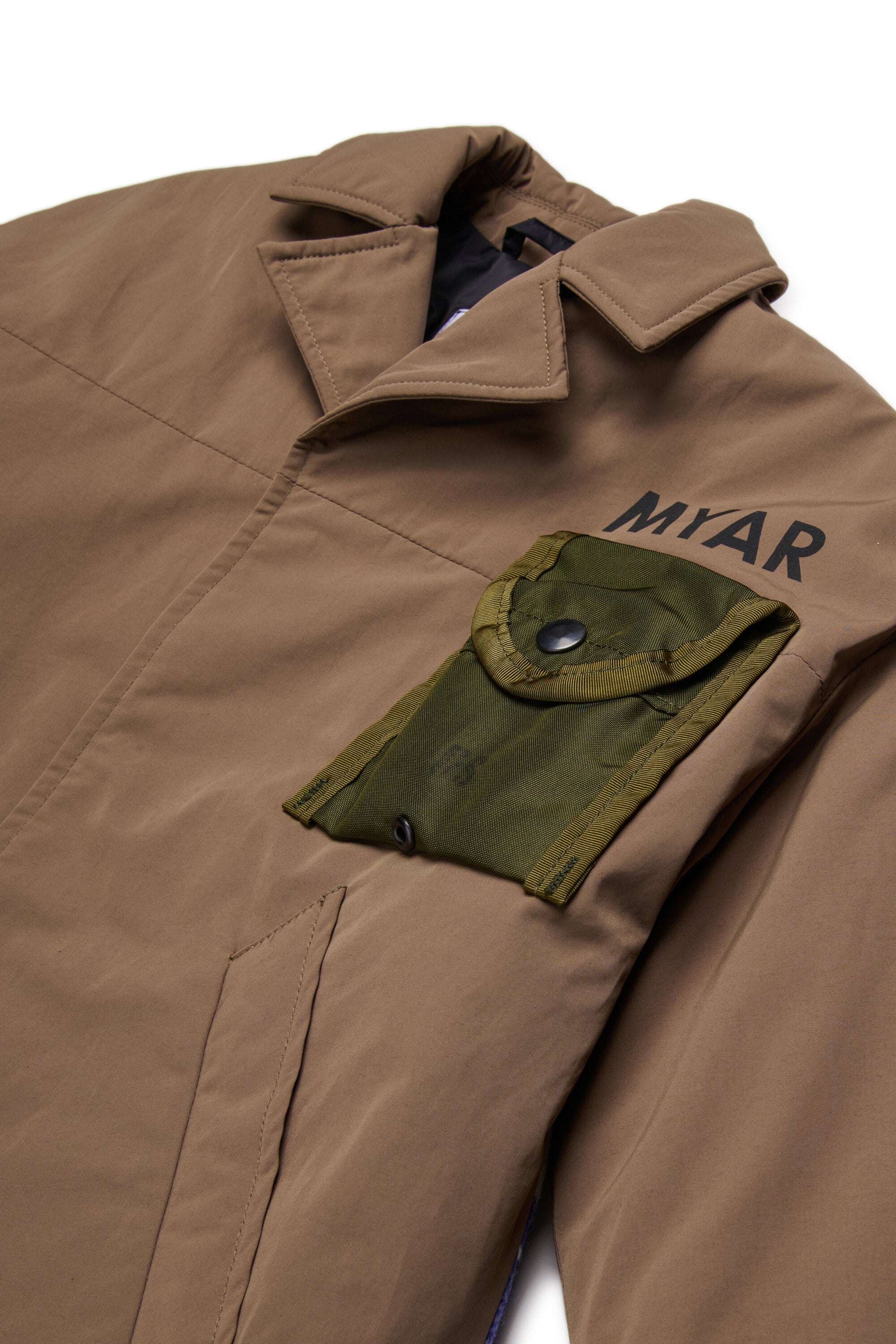 コンパスポケット付きトレンチコート