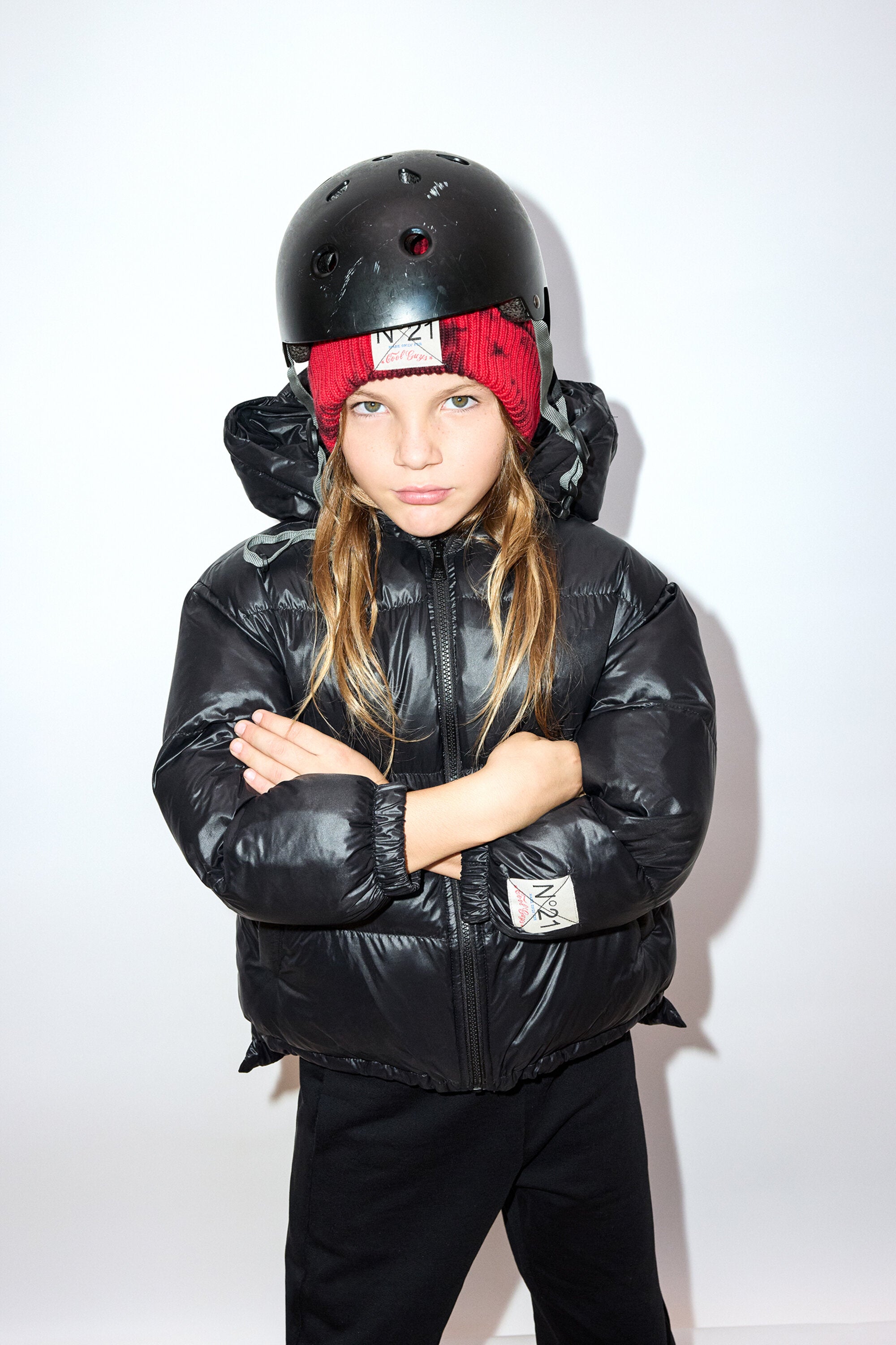 Short padded jacket with asymmetrical bottom