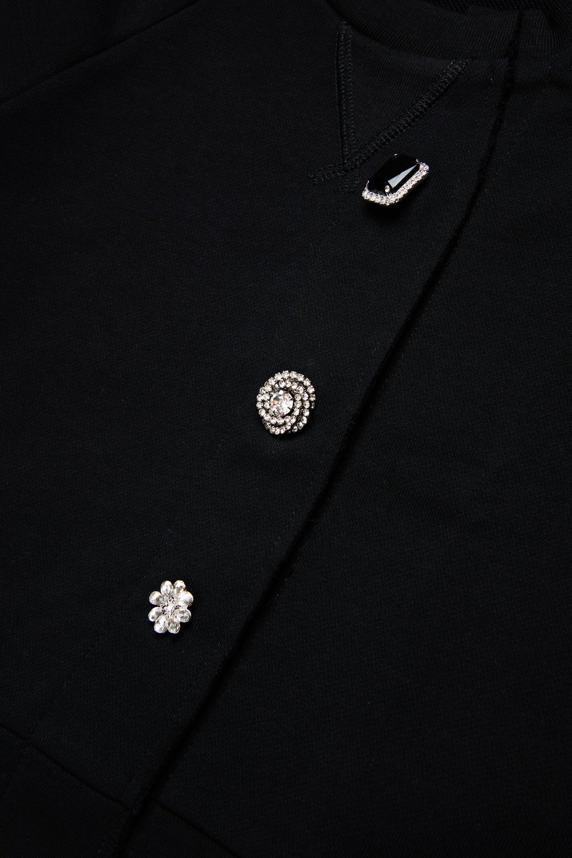 ジュエルボタン付きカーディガン風スウェットシャツ