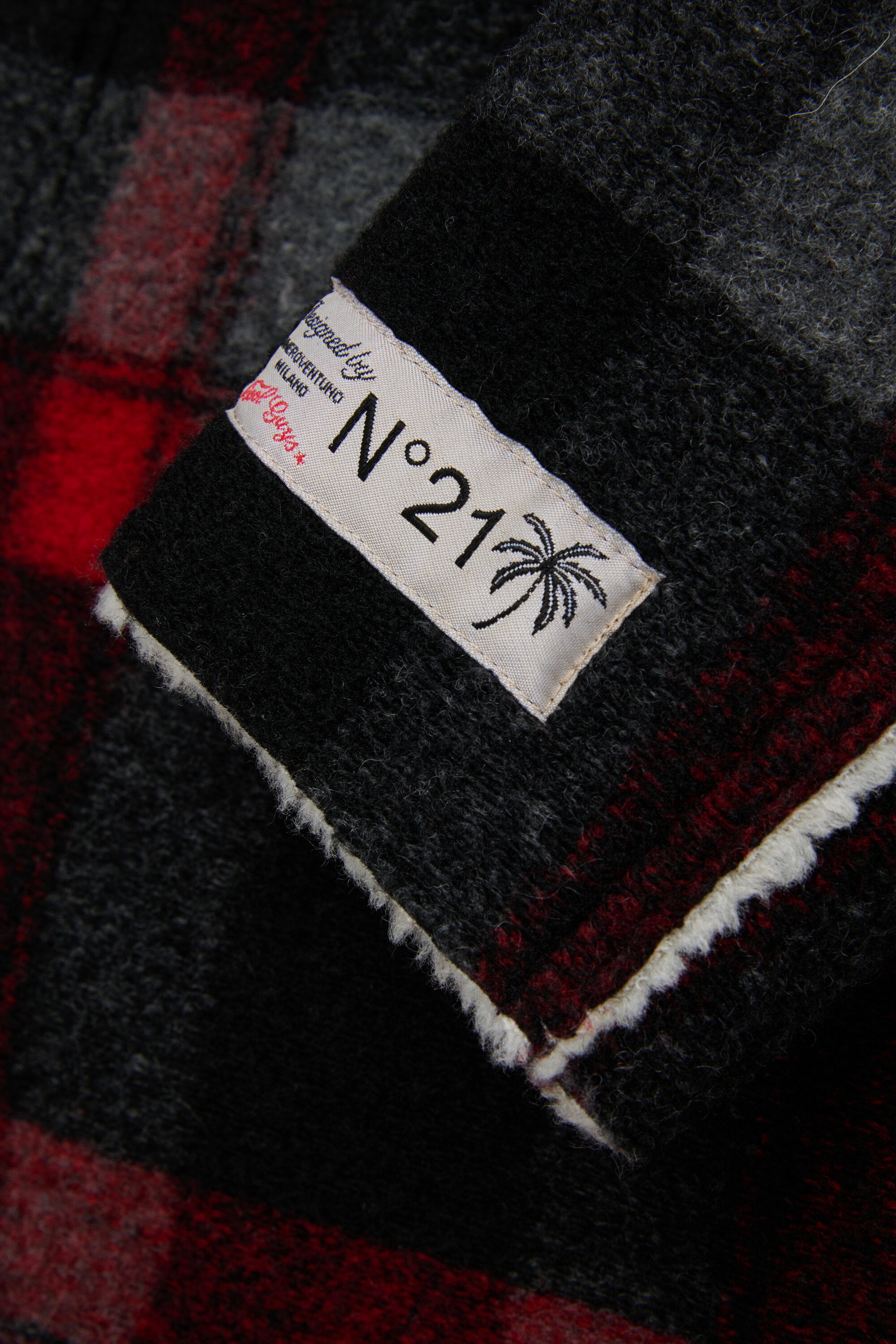 Checked coat with printed logo