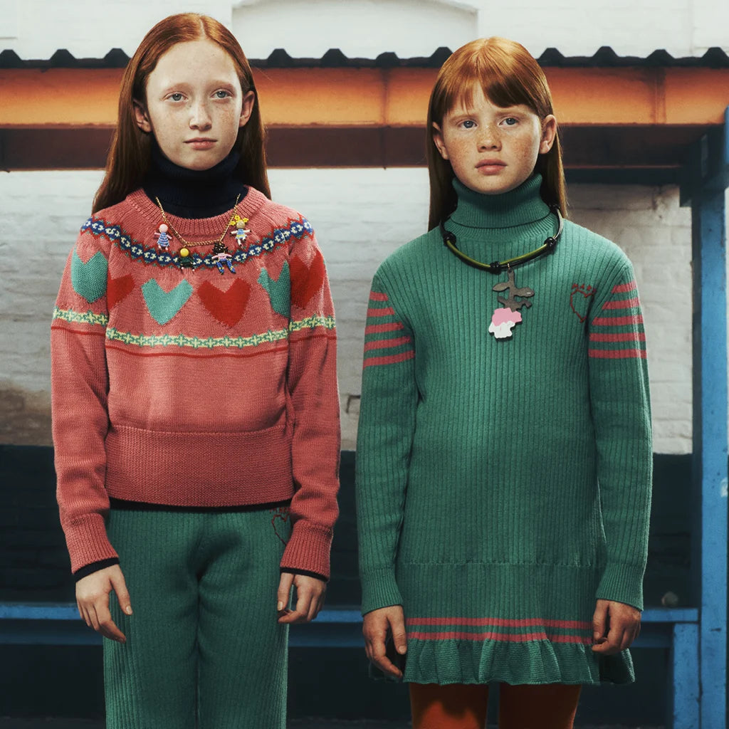Two girls wearing colorful and warm looks designed by Marni