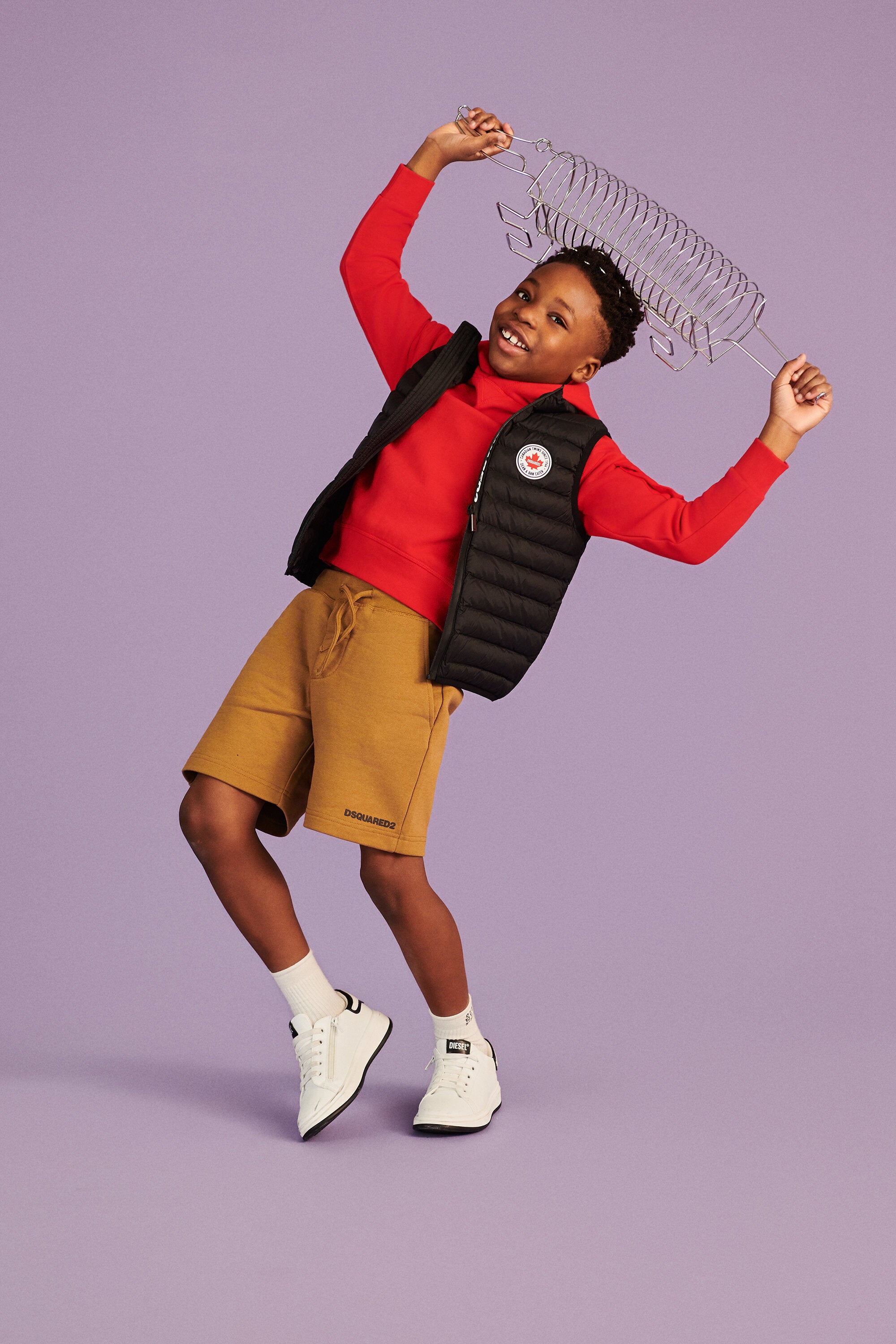 ロゴプリント入り中綿ベストジャケット