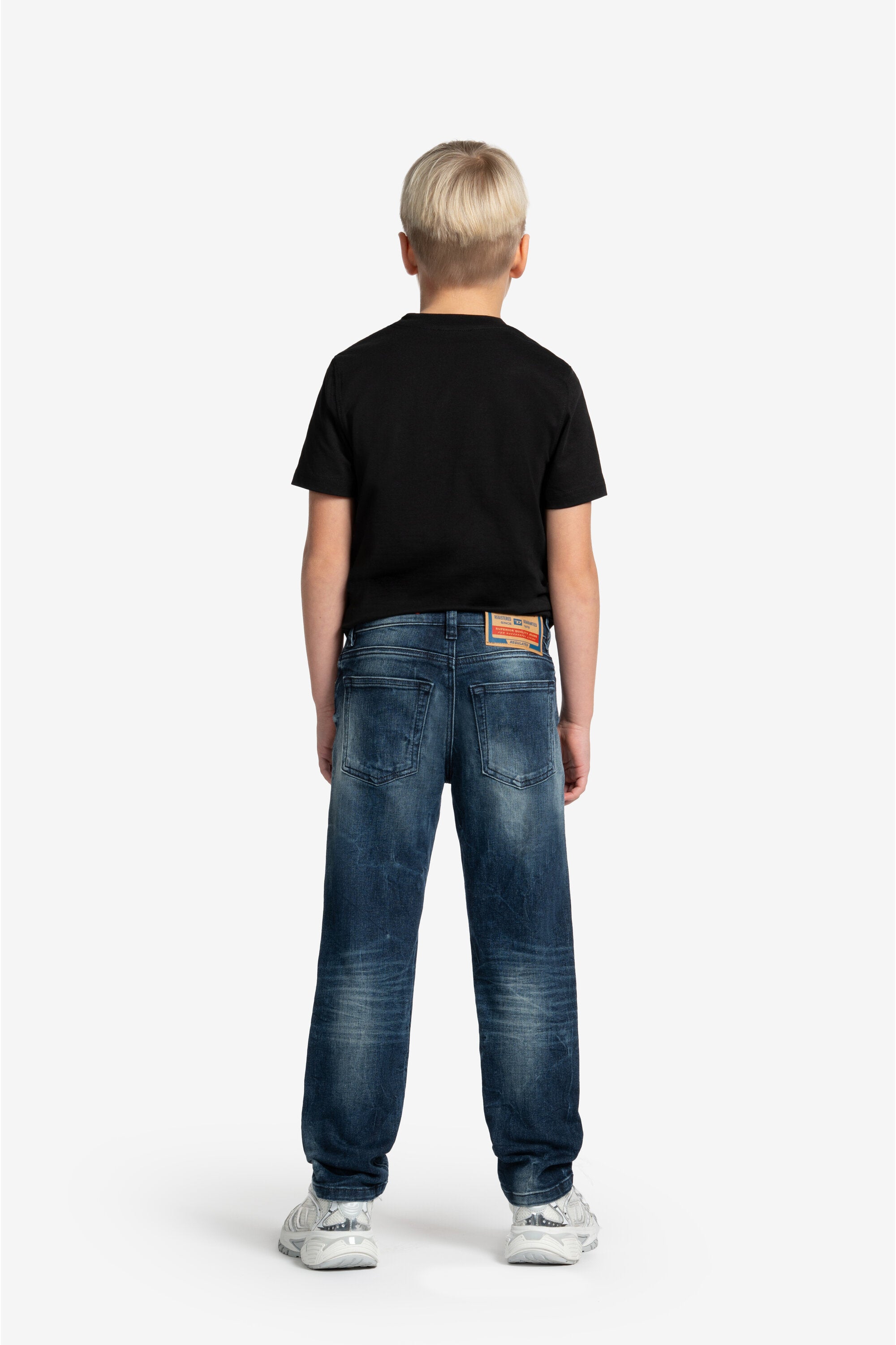 ブレイク入り濃紺レギュラージーンズ - 2010