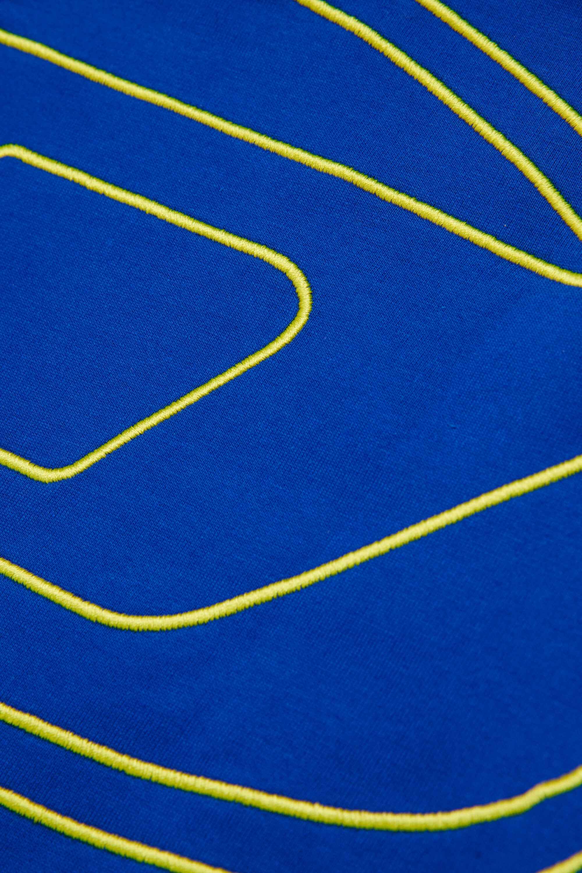 マキシOval Dロゴ入りTシャツ