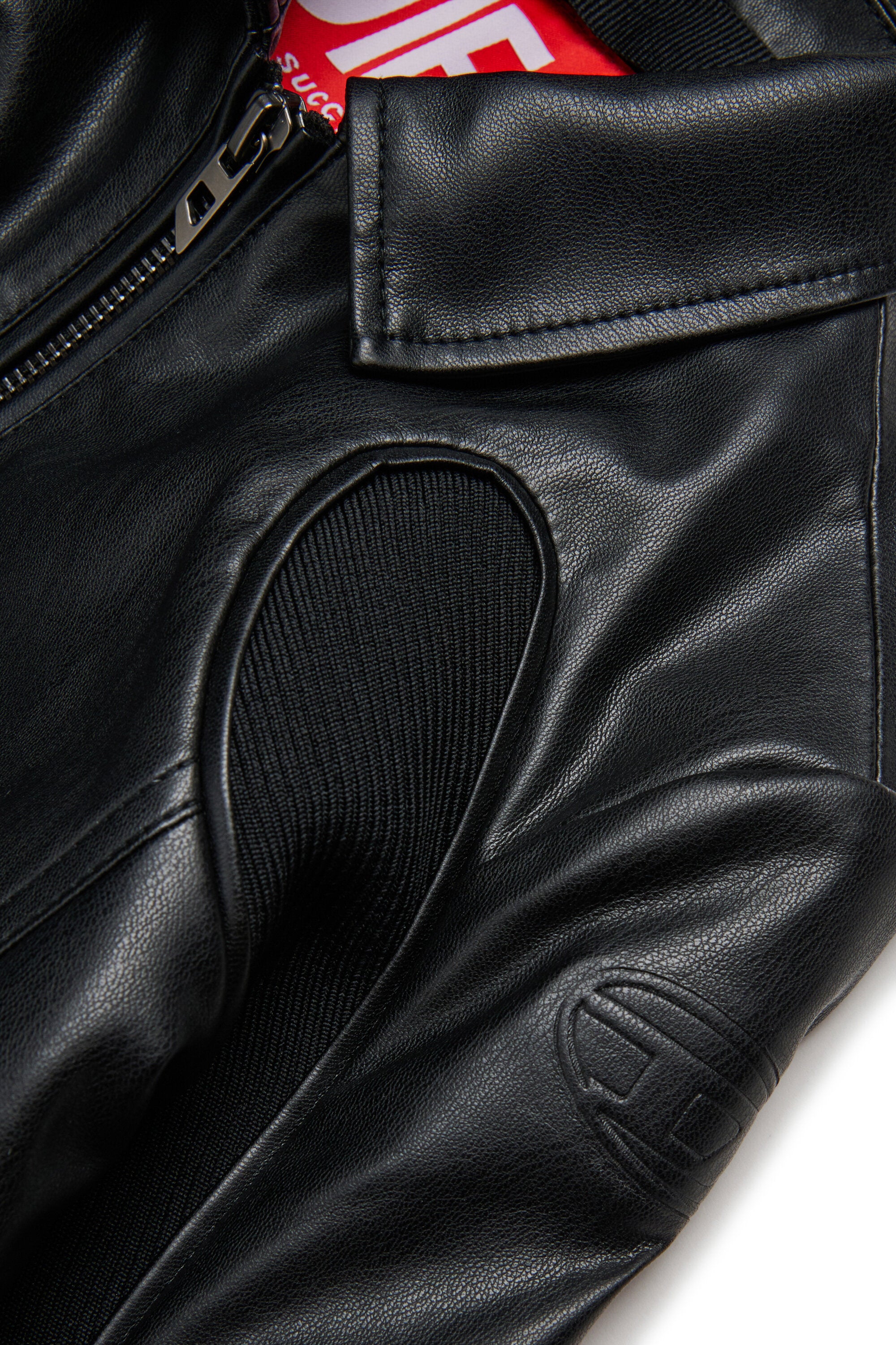 Coated fabric jacket with stretch inserts