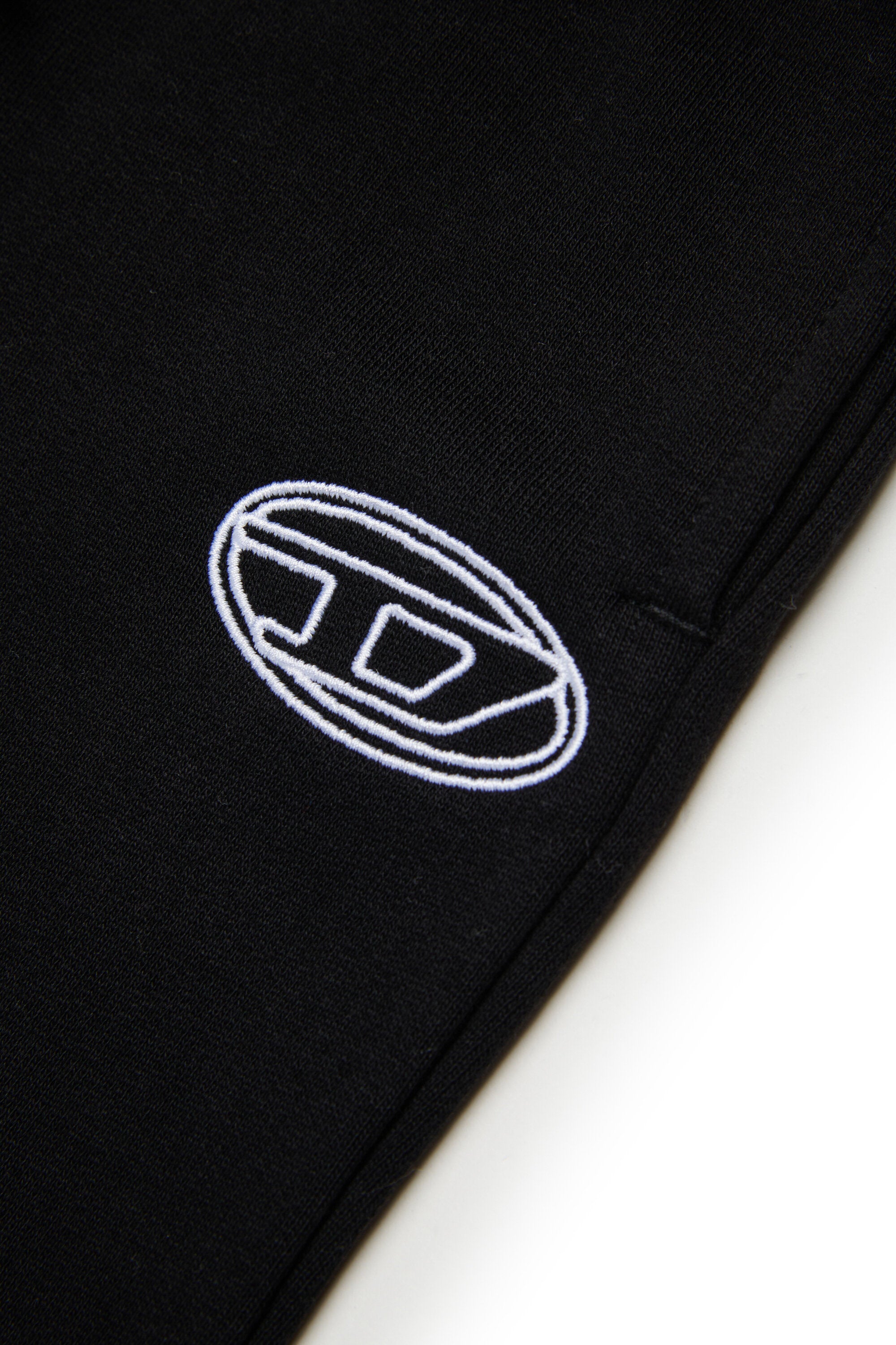 オーバルDブランドのブーツカットパンツ