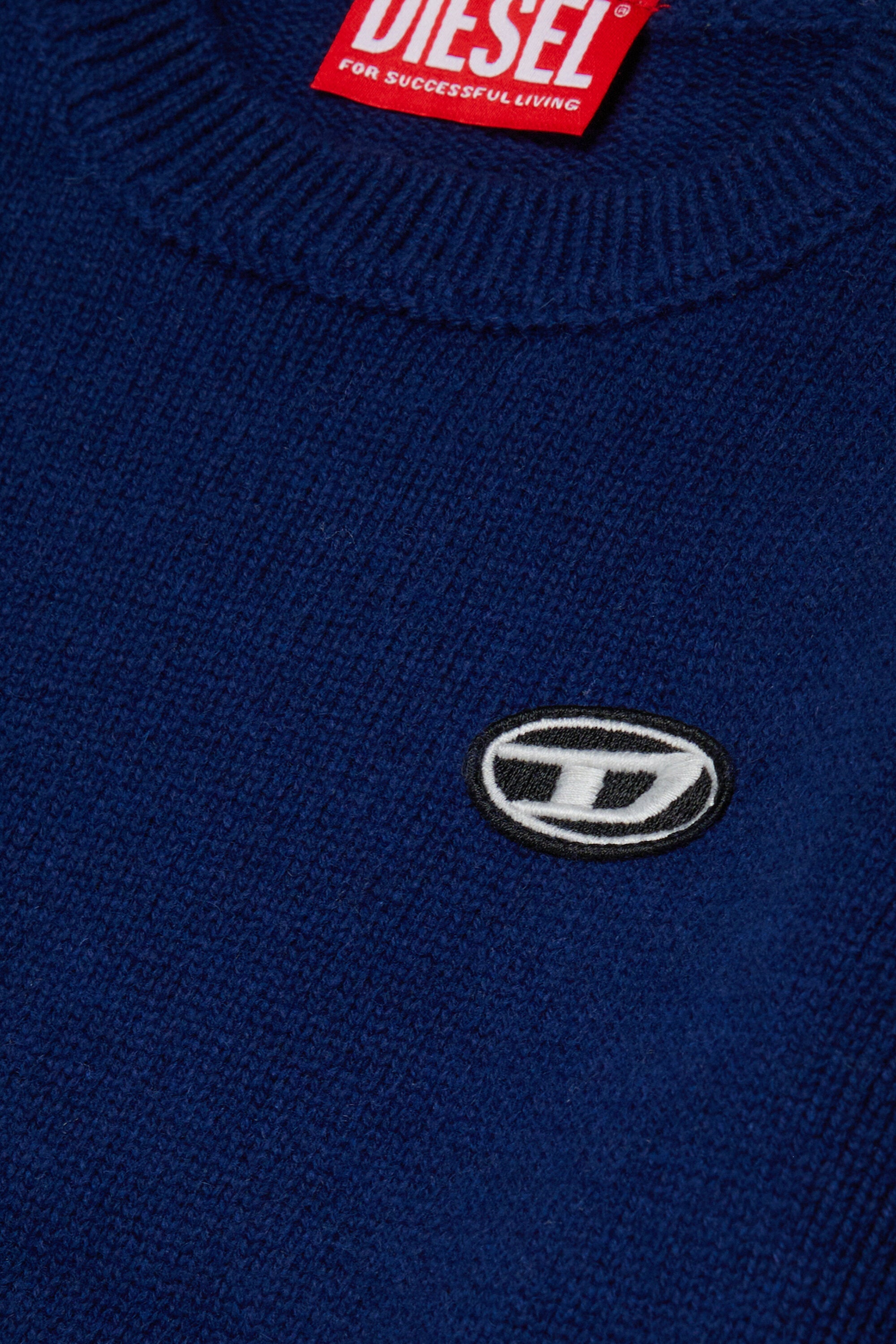 Wool and cashmere blend sweater with patches