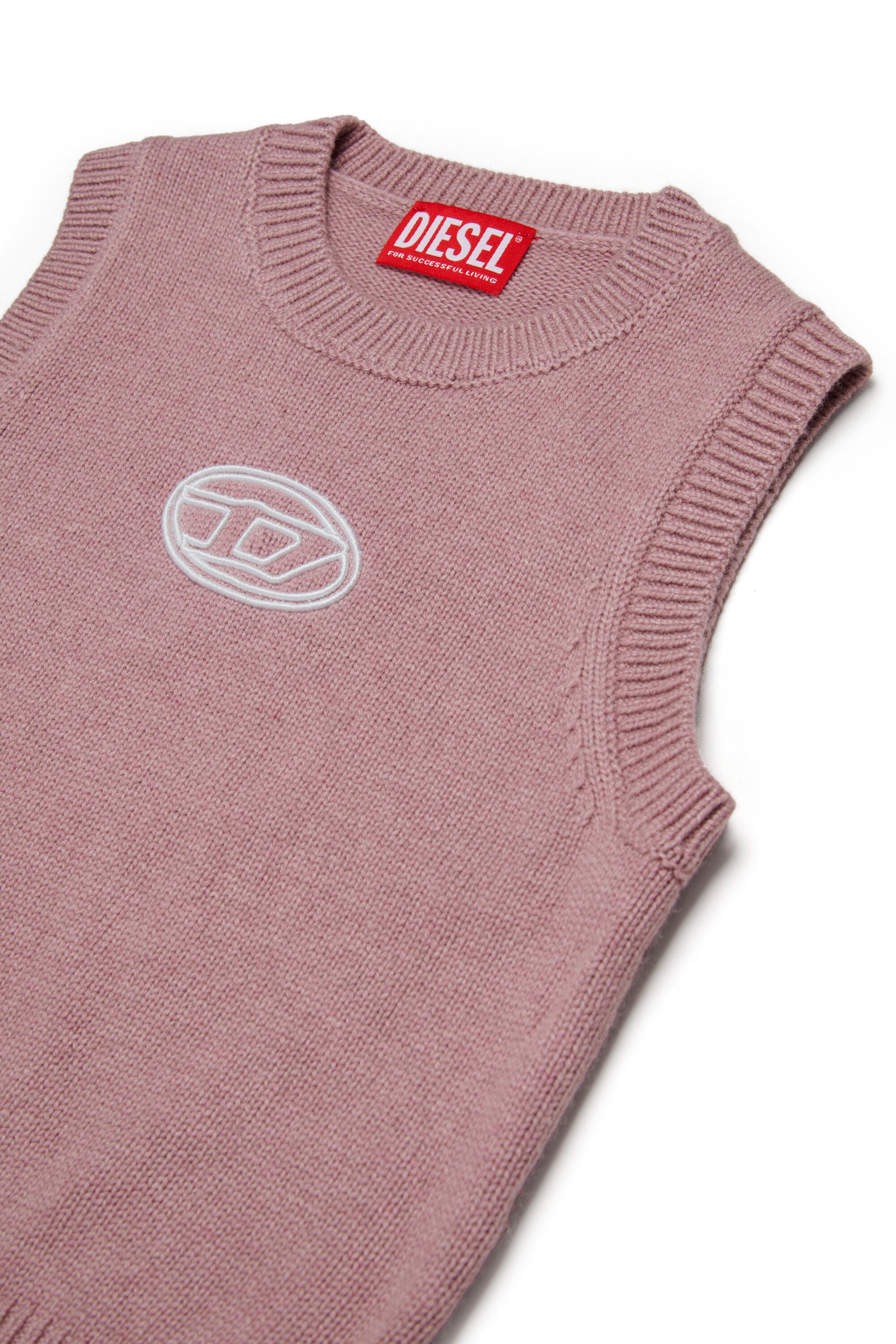 オーバルDのロゴ入りカシミア混ベスト