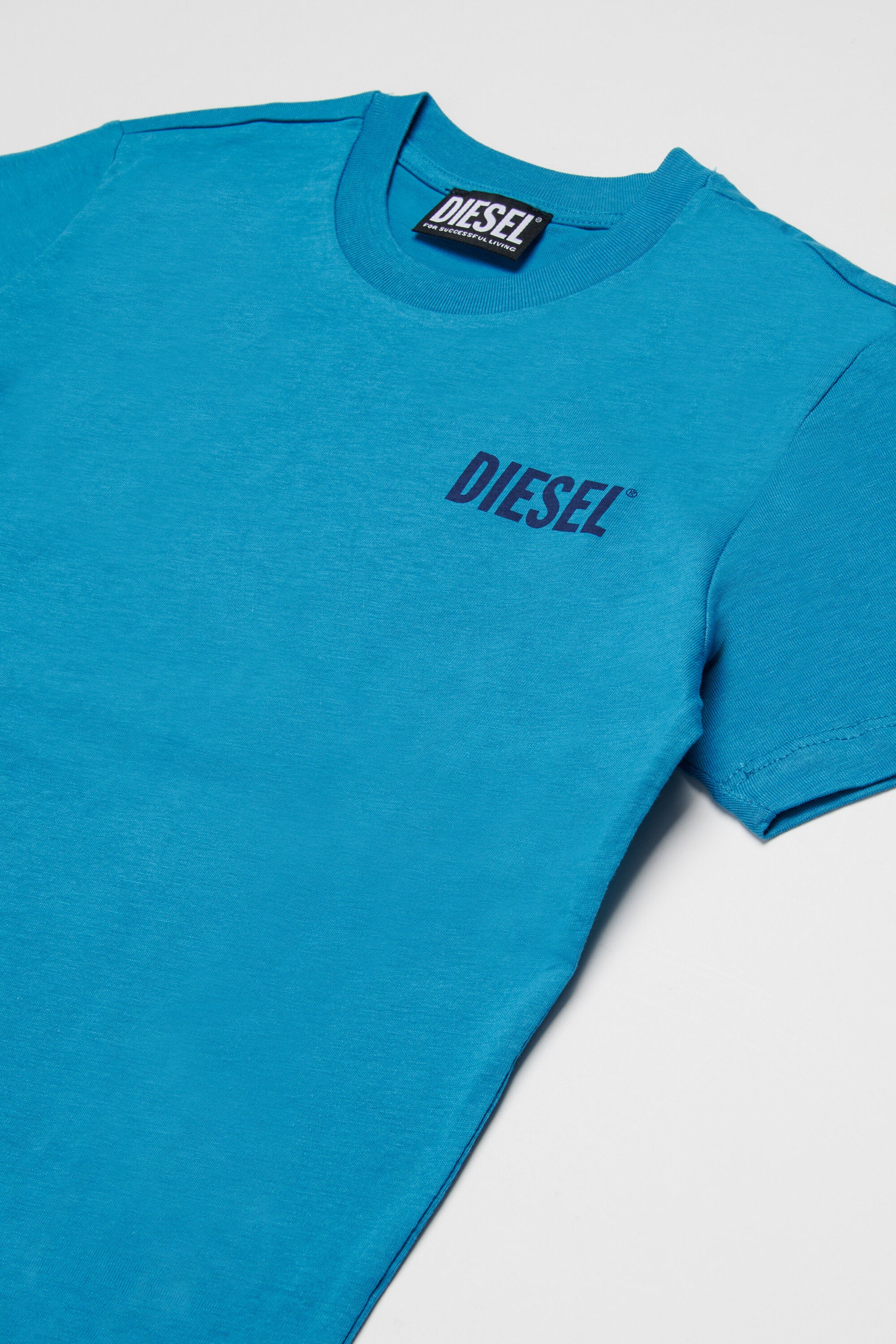 ロゴ入りTシャツ