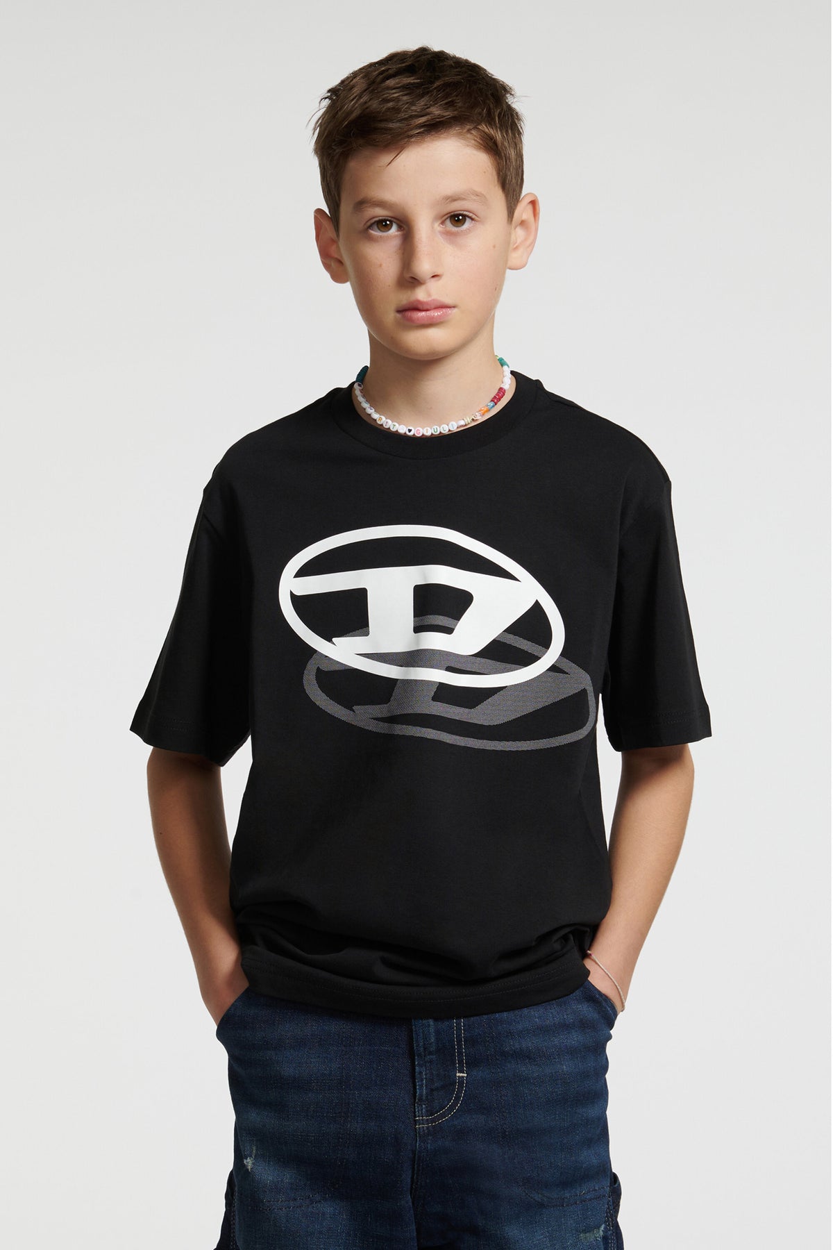 オーバルDロゴプリントTシャツ