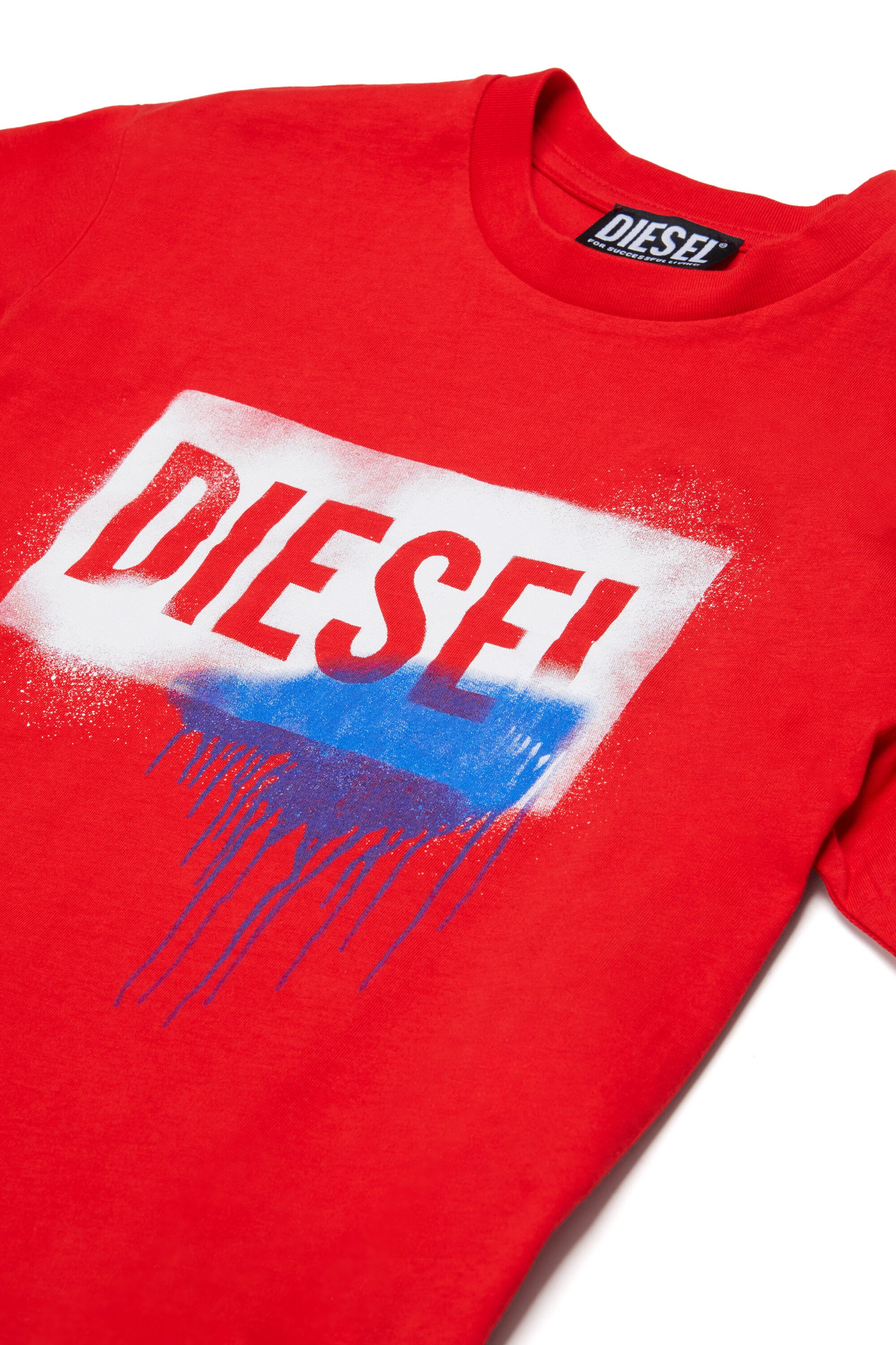 ロゴ入りTシャツ