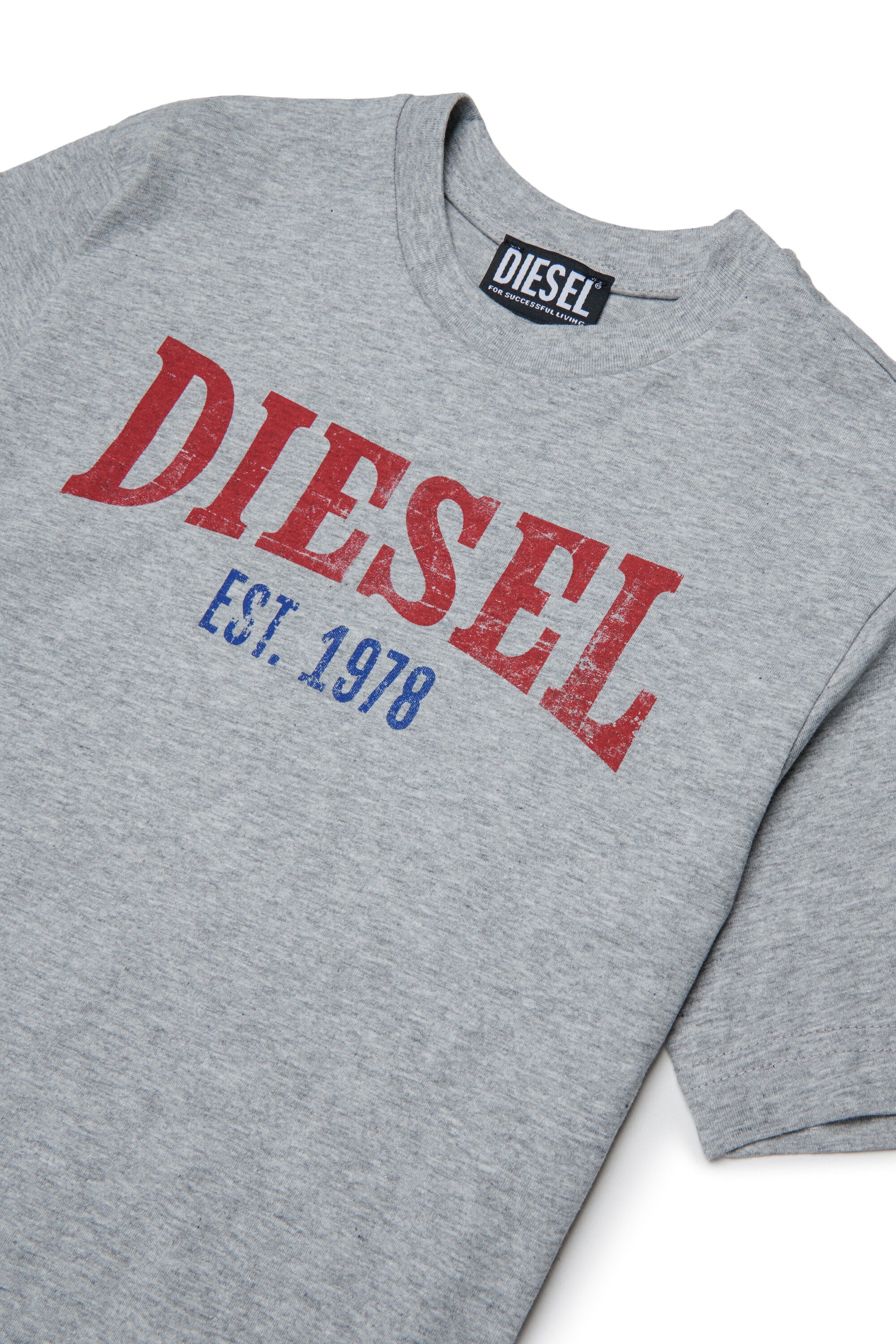 ロゴ入りTシャツ